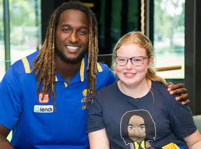 Make-A-Wish Australia wish kid Jacinta with Nic Naitanui in Perth