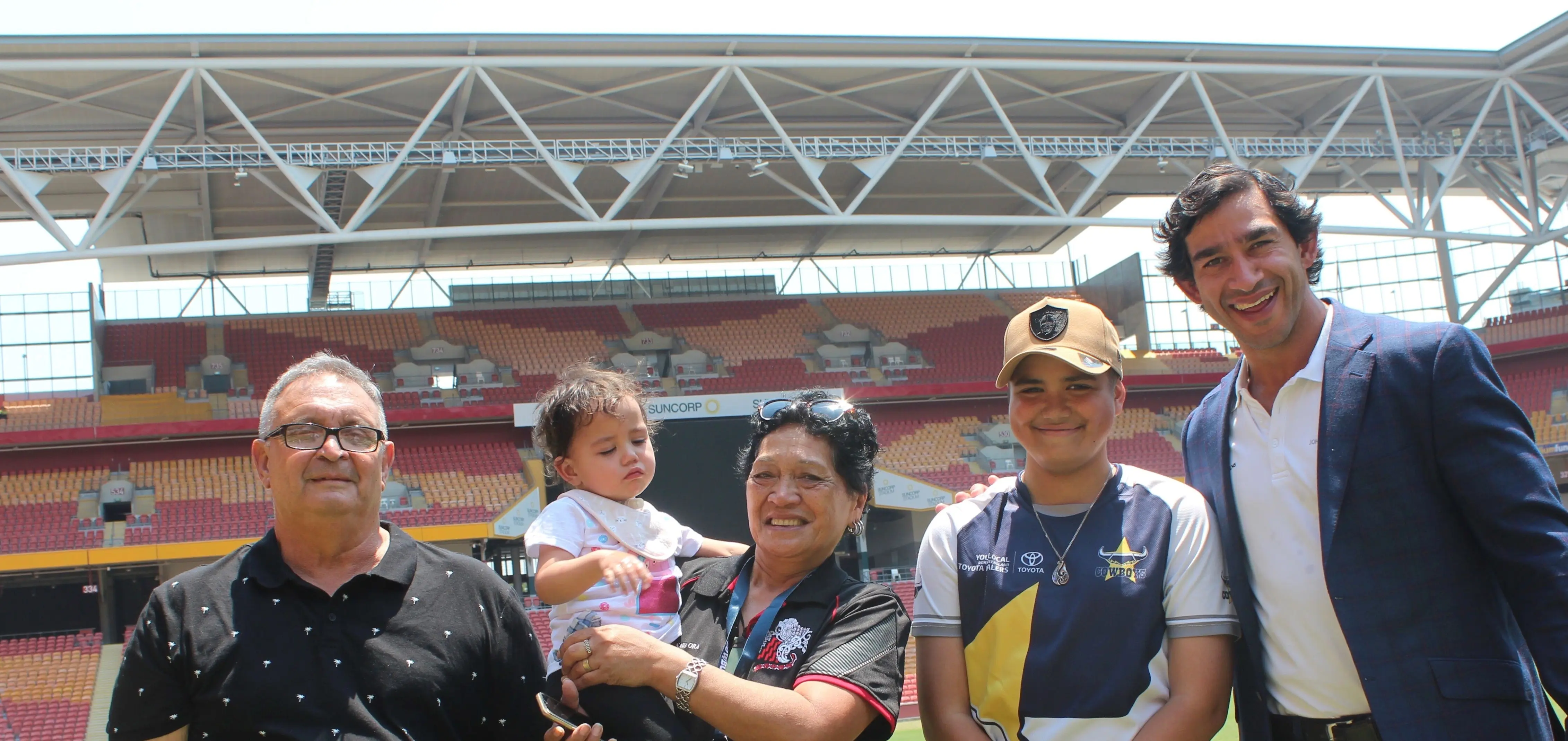 Brodi and his family with Johnathan Thurston