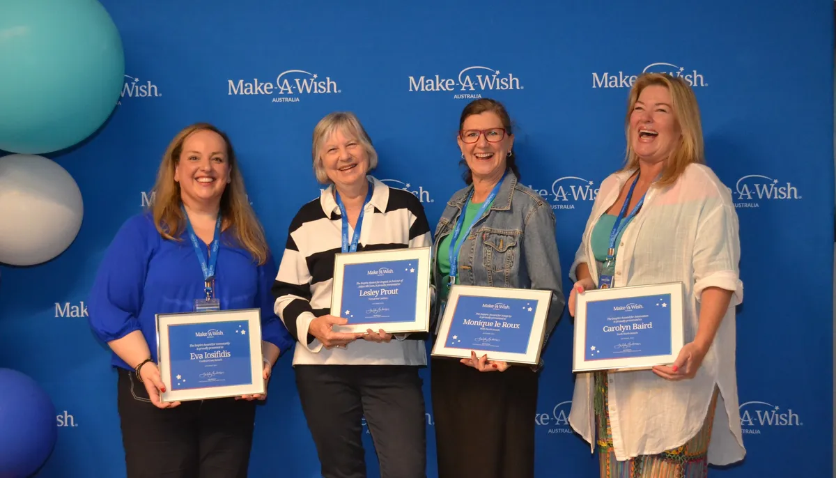 Make A Wish Australia Children's Charity - Hall of fame volunteer winner 2018 Emma standing with her certificate