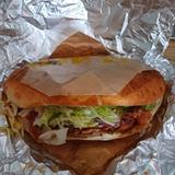 A tasty flatbread kebab showing meet and veggies