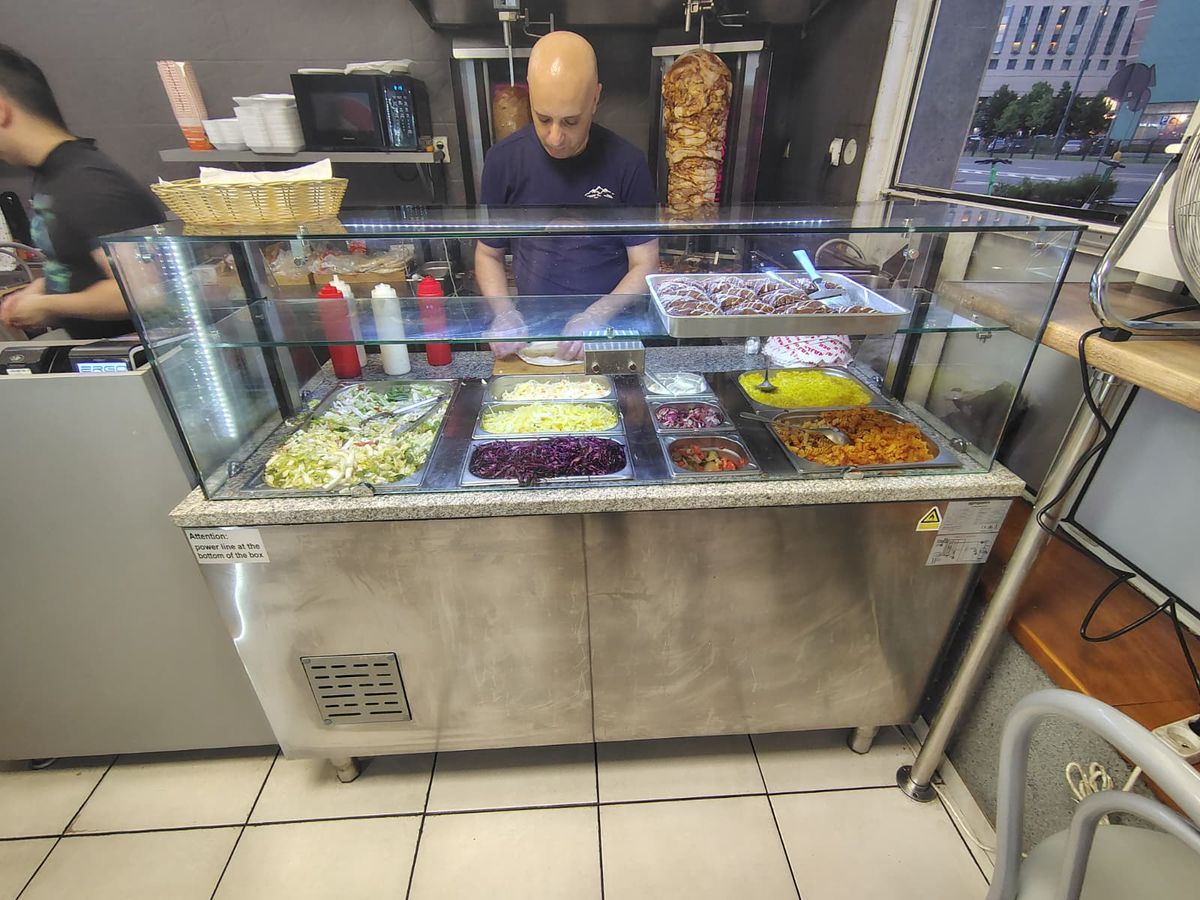 The kebab master crafting the kebab