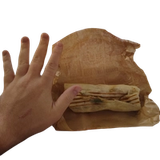 The seeker holding up his hand which eclipses the size of the small kebab