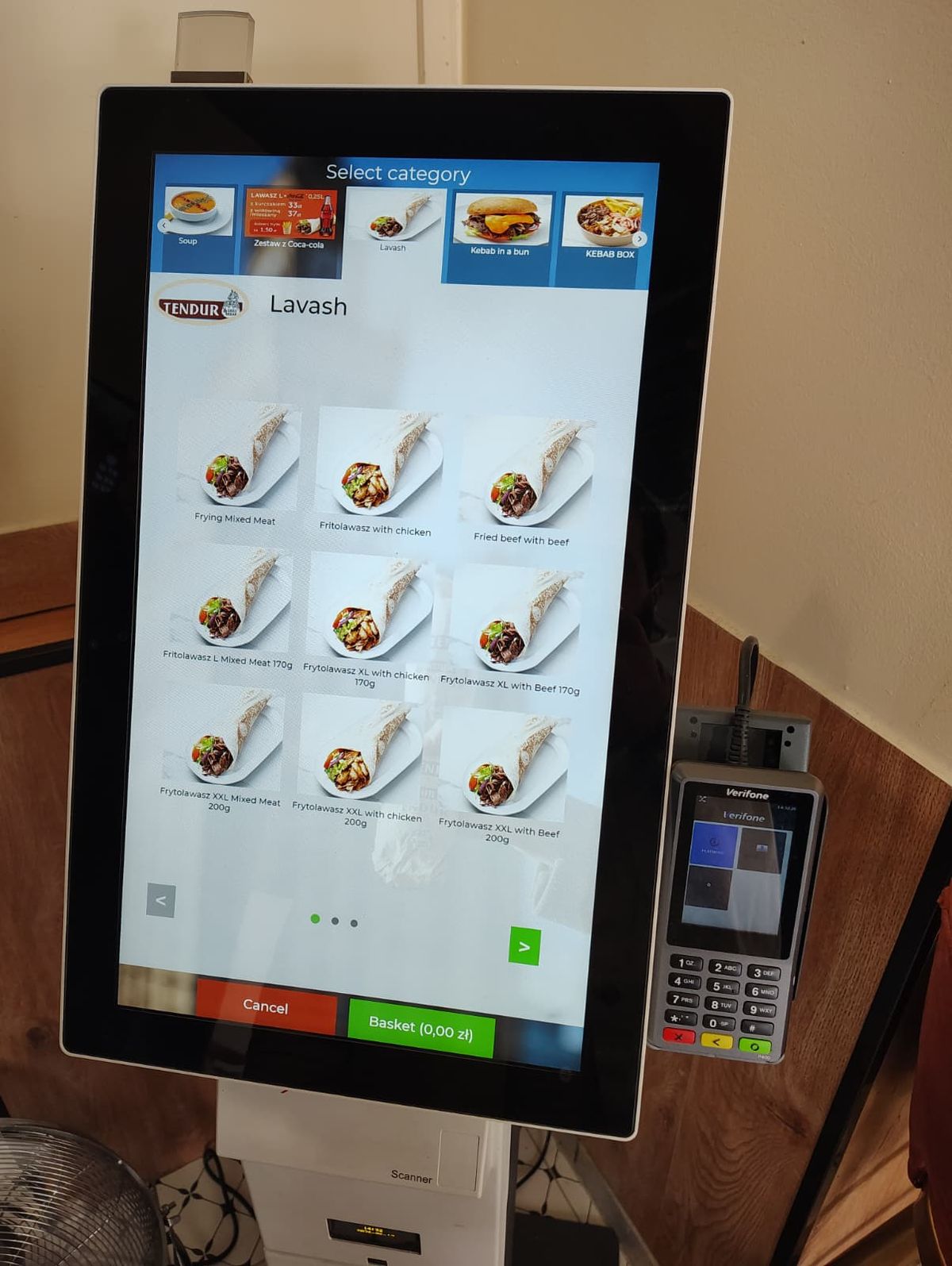 Self-ordering kiosk showing various kebabs