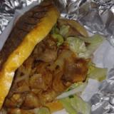 A chicken kebab on pita bread