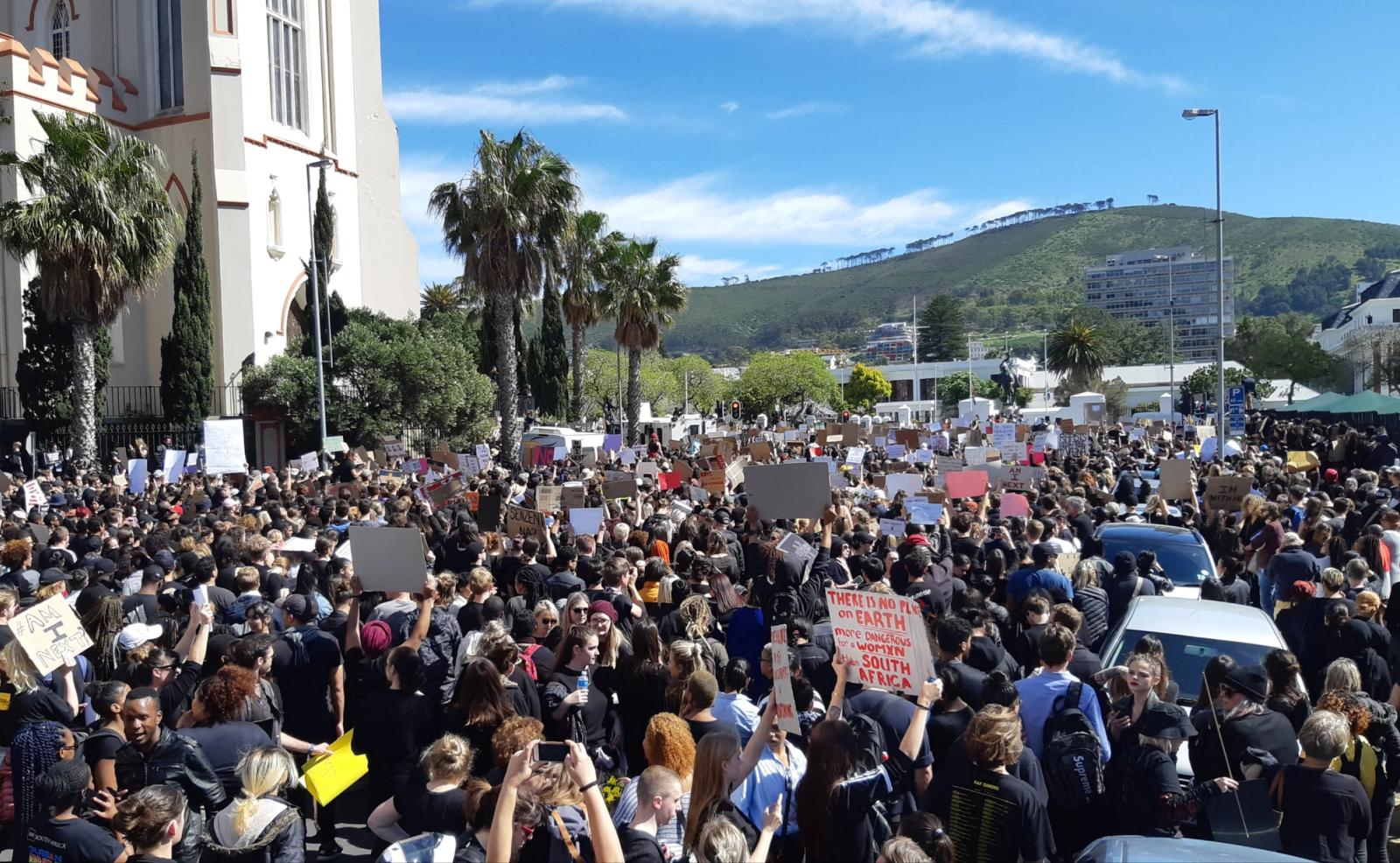 Thousands of protesters gather in Cape Town after the 2019 murder of a South African woman