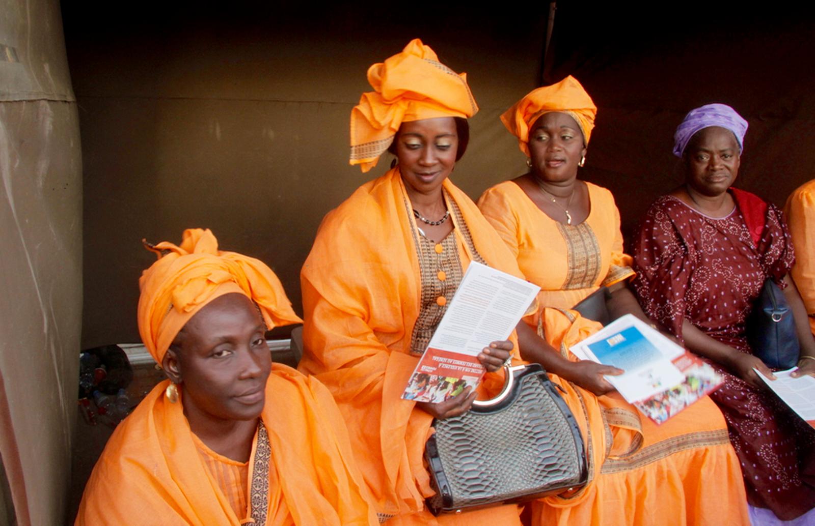  Senegalese women participate in the UN’s “orange the world” campaign against gender-based violence