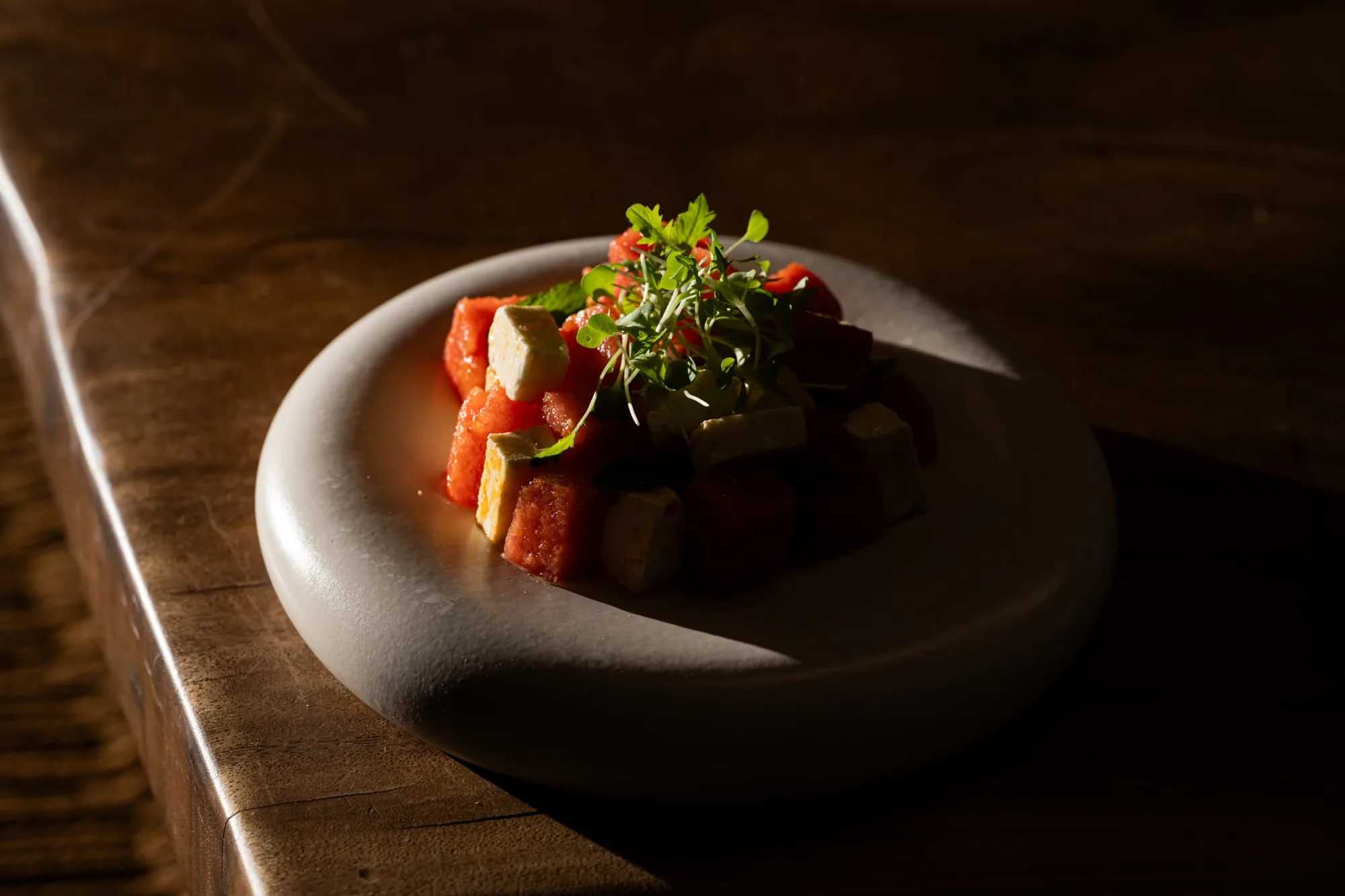 Plated dish on a stone bowl