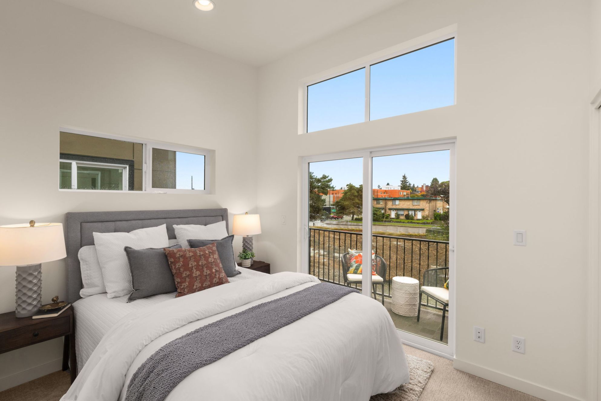 Primary suite opening to a private balcony