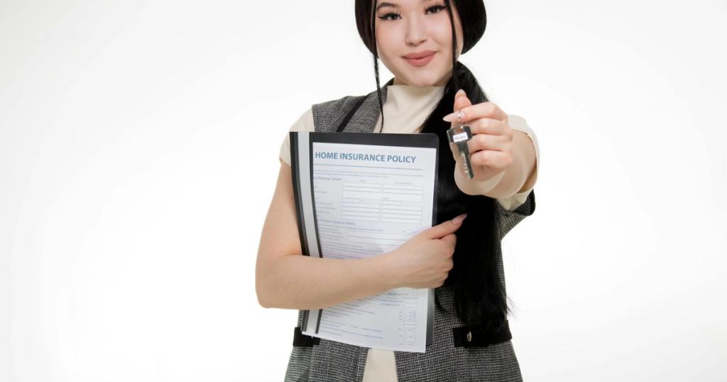 Asian woman smiling while holding a home insurance policy and a key, symbolizing new home ownership.