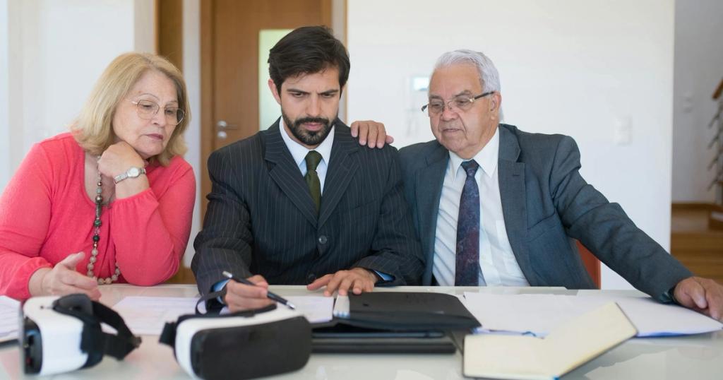 Senior couple in a meeting with a real estate agent discussing property details.