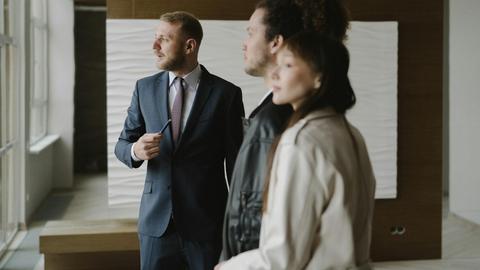 Professional team discussing strategy in a stylish modern office environment.