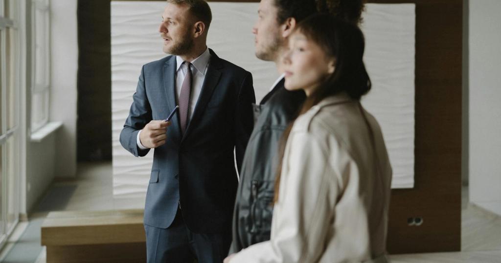 Professional team discussing strategy in a stylish modern office environment.