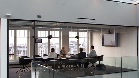 people sitting on chair inside building