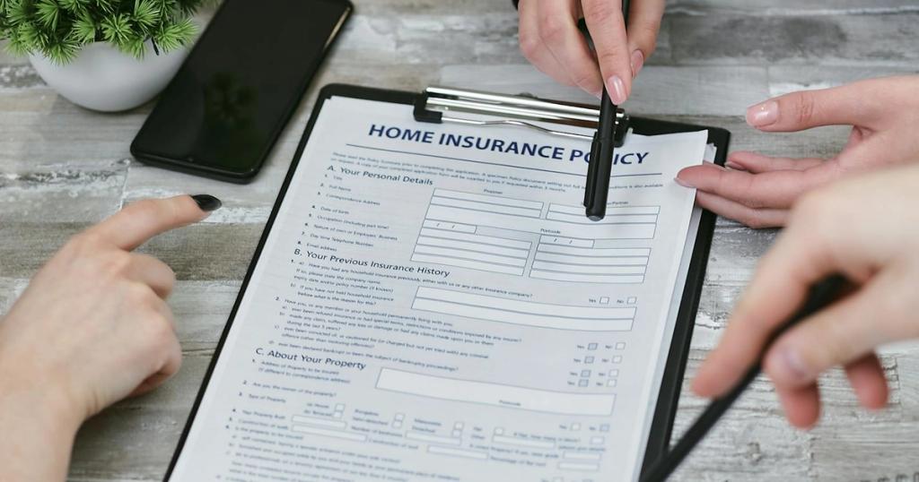 Three individuals collaborating on a home insurance policy document. Elements include a clipboard, notes, and pointing hands.