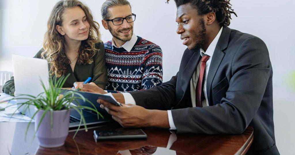 A diverse group of professionals collaborating in an office meeting, showcasing teamwork and partnership.