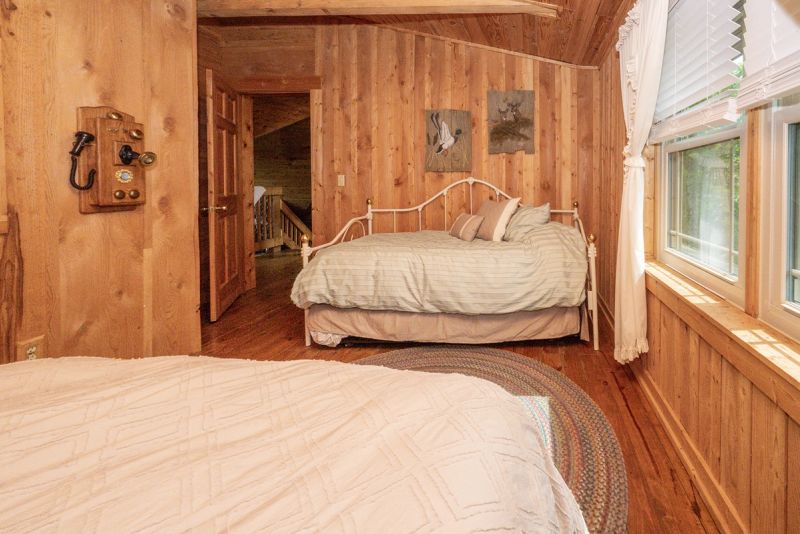 Third bedroom featuring a Queen Bed, Murphy Bed, and Twin Bed