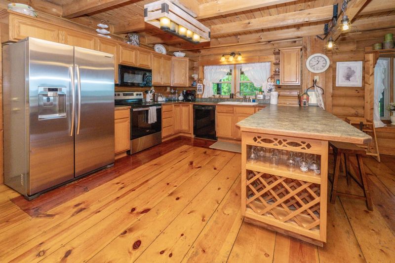 Spacious kitchen with modern appliances and central island