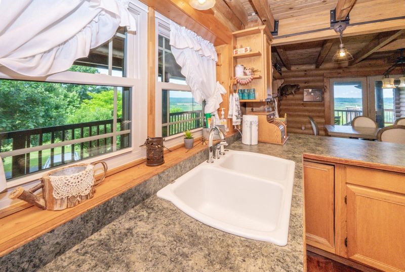 Spacious kitchen with modern appliances and central island