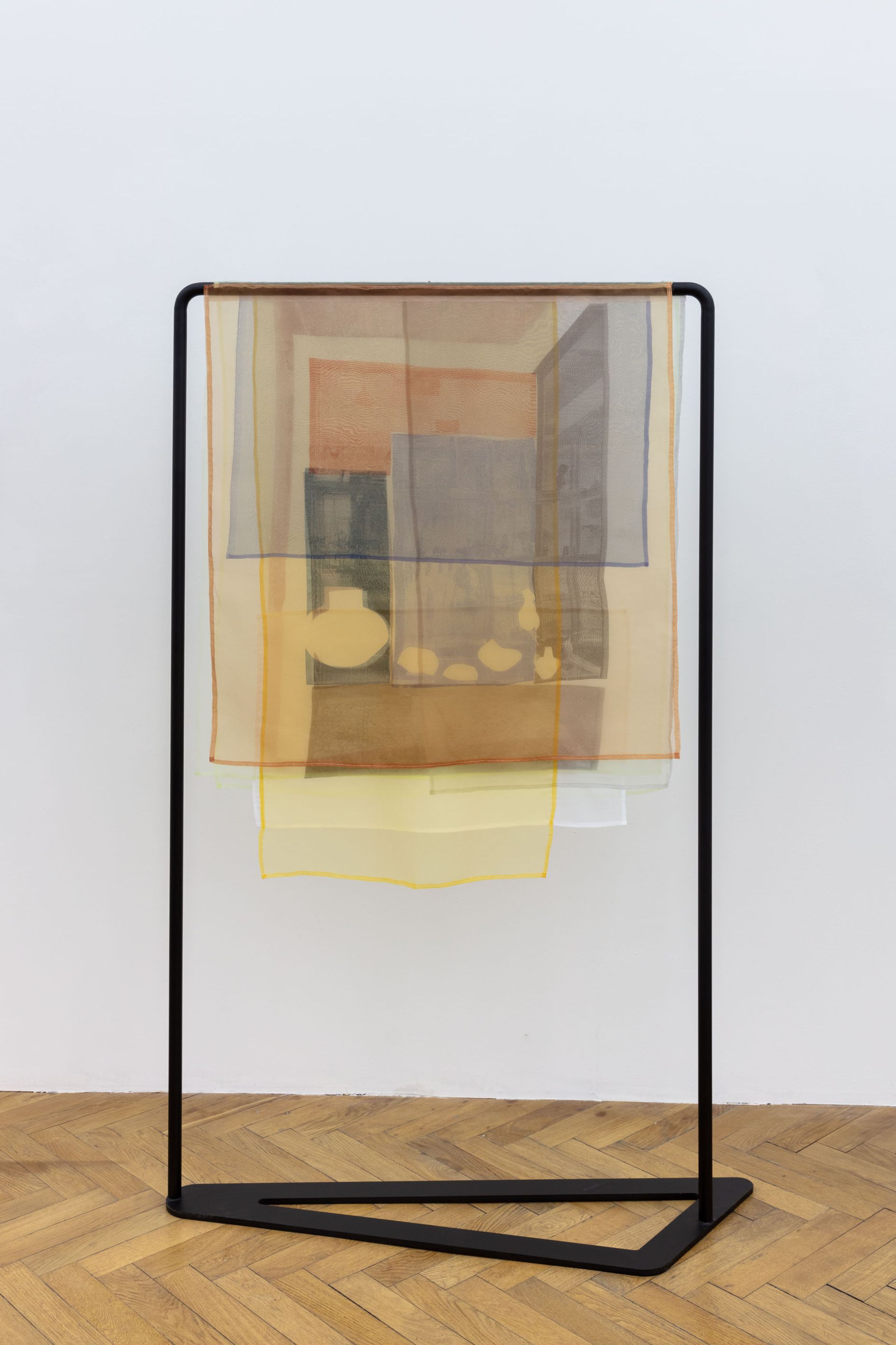 Ana Navas, Lines under a tangerine light, 2021, silkscreen on translucent textile, custom metal rack, 186 x 103 x 35 cm