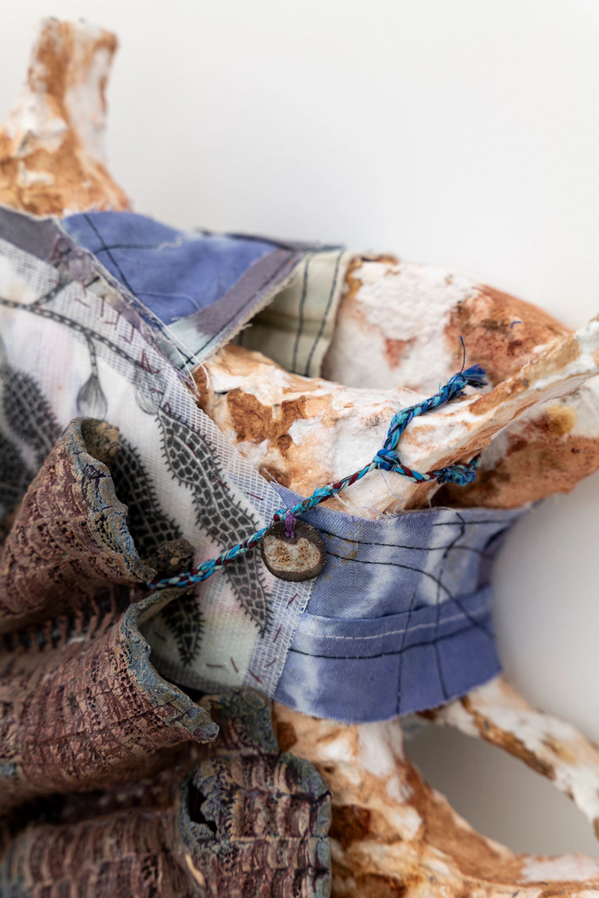 Isabel Nuño de Buen, Codex 50 (thinking of you – 1.8. light years distant), 2025, Paper maché, wire, glazed ceramic, yarn, transparent paper, paper, graphite, charcoal, watercolor, muslin, hand dyed fabric, hand made cords
47.5 × 48 × 12 cm (Courtesy: Chris Sharp, LA)