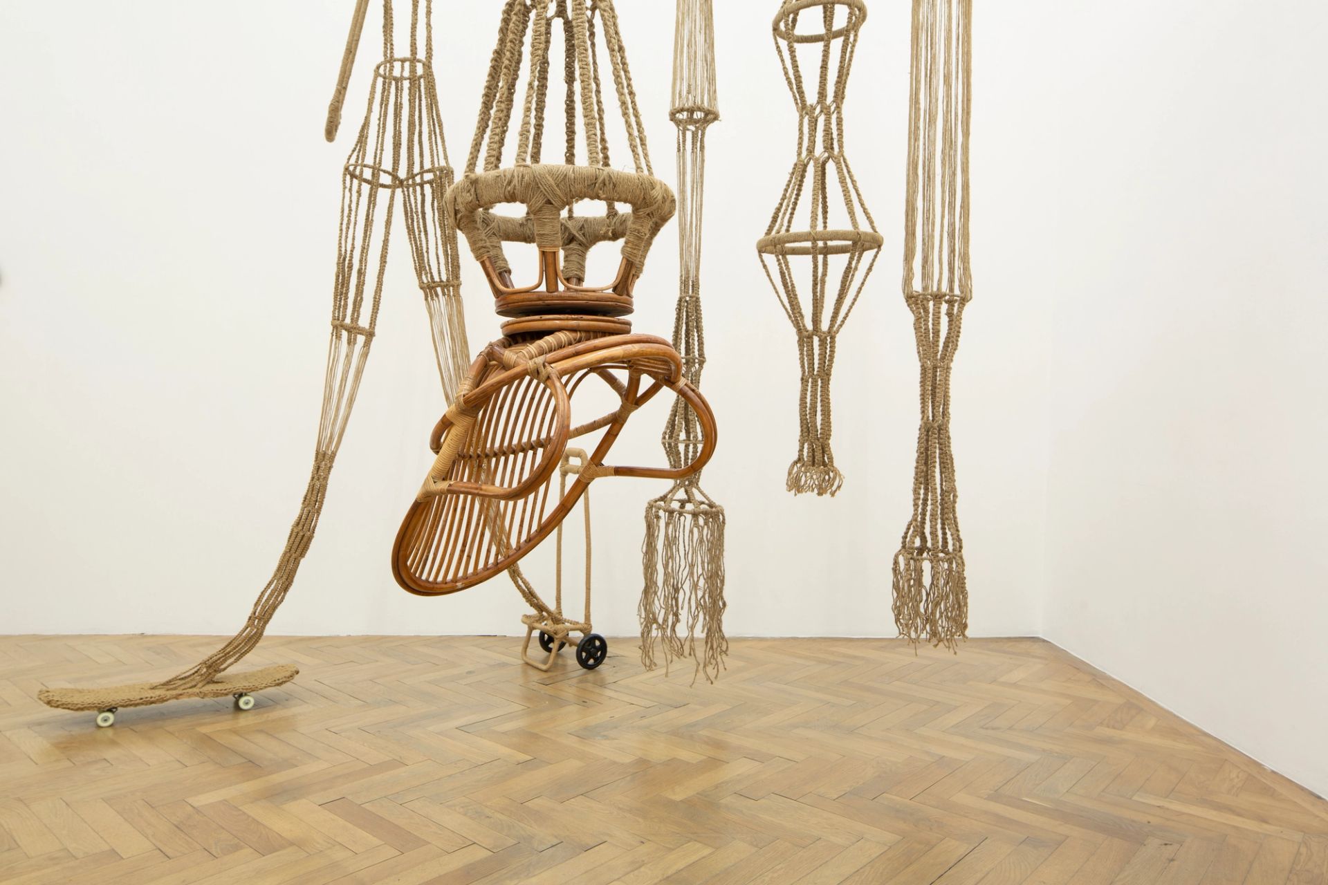 front: Maddy Arkesteyn, Untitled (from the series: Brancusi’s Psychosis Goes Exotic), 2010, Macramé (knotted rope), wire, wooden chair
300 × 70 × 70 cm, photo by Constanza Meléndez