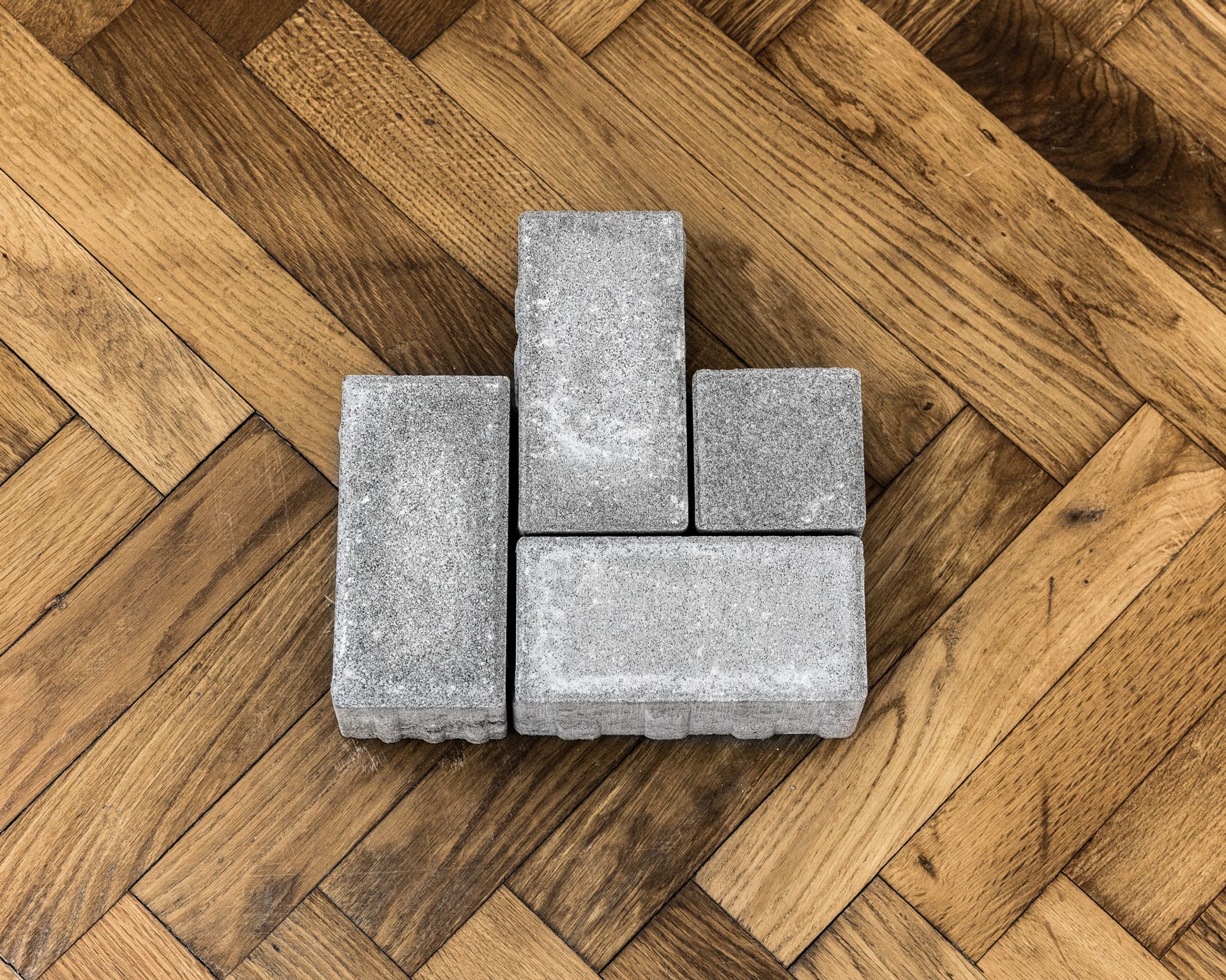 Thomas Geiger, A stage to hide a secret, 2017, concrete paving stones, adhesive letters, 30,5 × 30 × 8 cm 