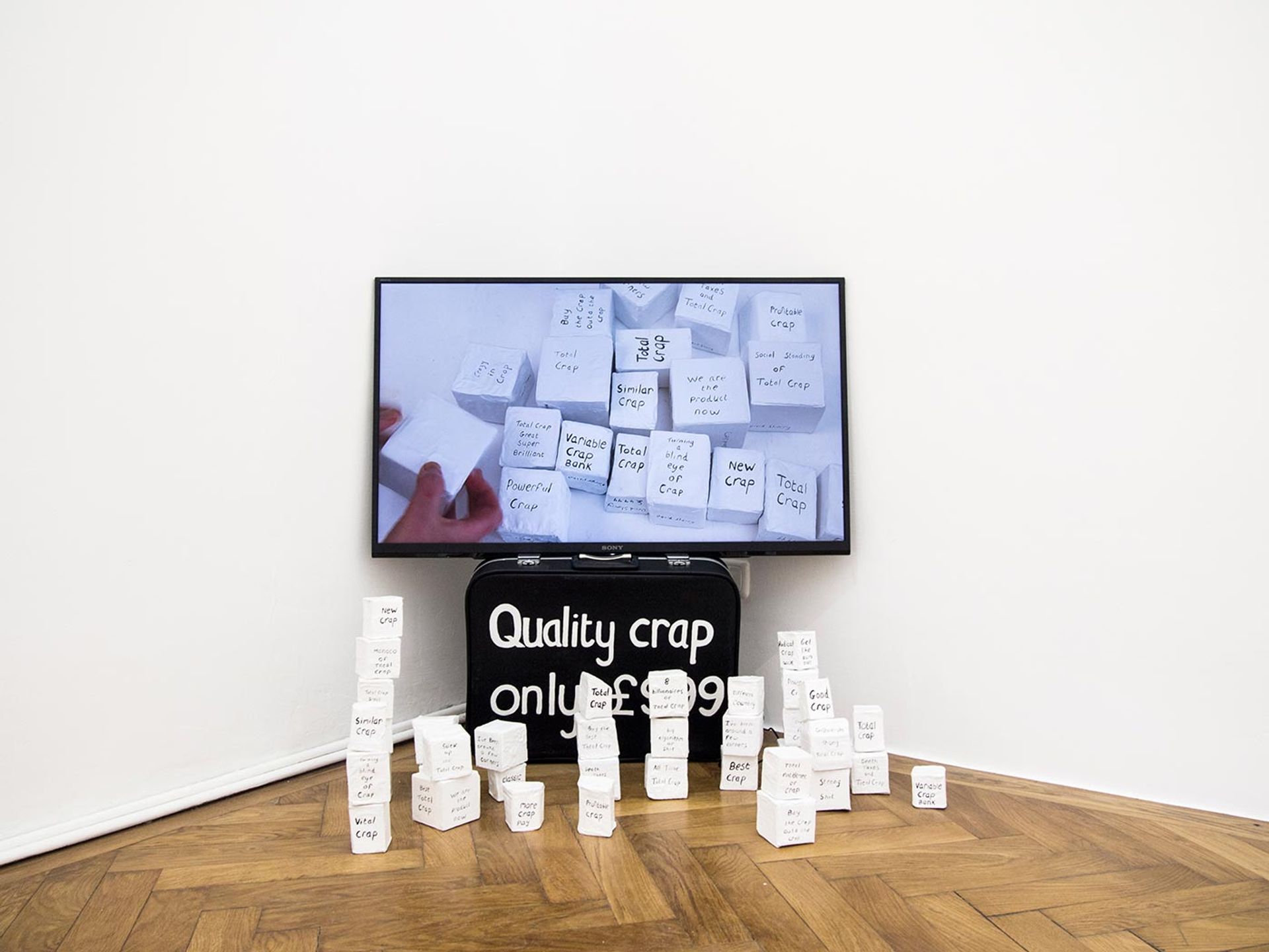 David Sherry, Quality Crap & Total Crap, painred boxes, various sizes, installation view, 2018