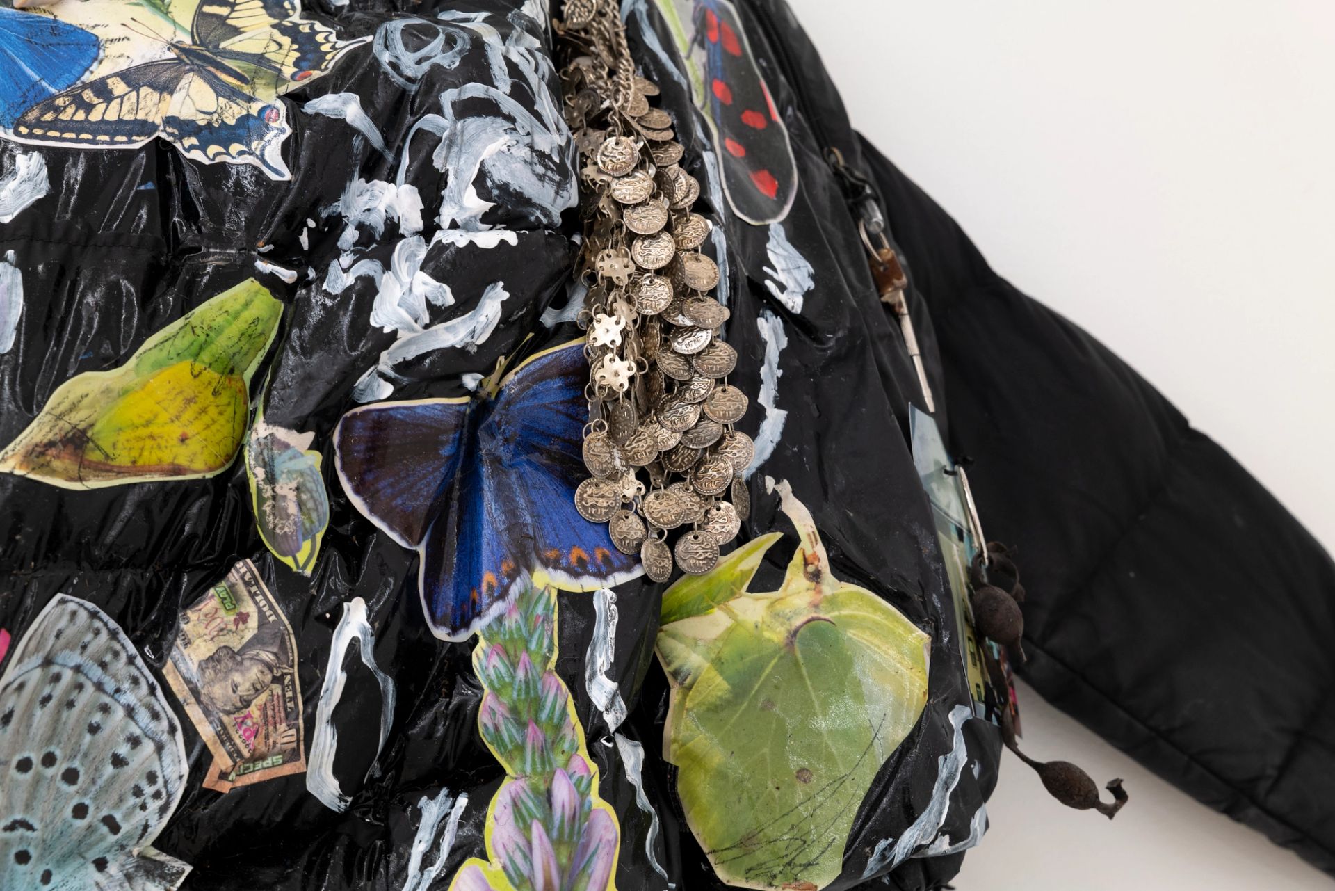 Anna McCarthy, Butterfly, fly away (kite), 2025, acrylic, paper, photograph on Northface jacket, hemp, leather, mixed media, 220 × 140 × 25 cm, dimensions variable