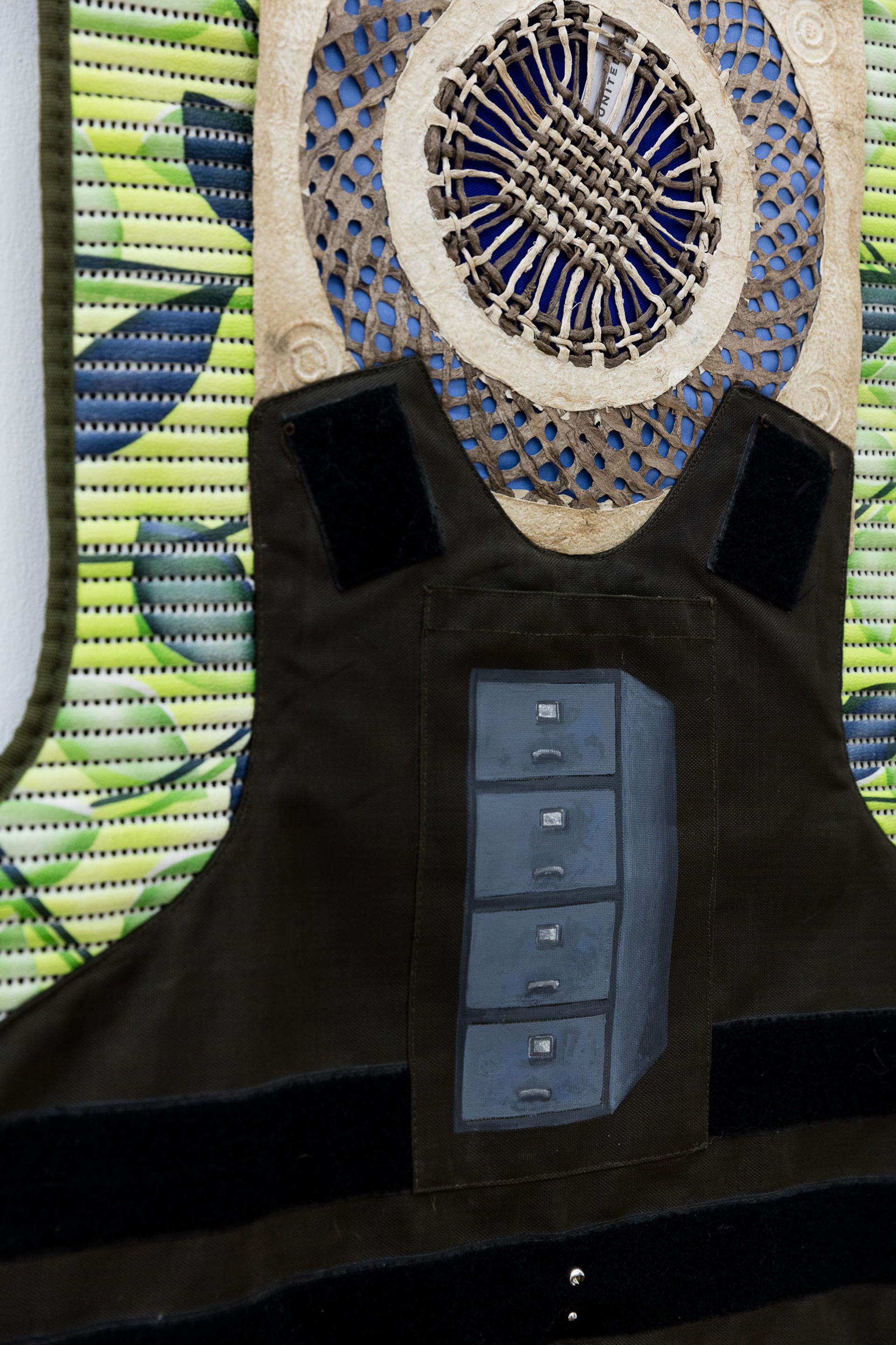 Ana Navas, United (Detail), 2018, mat, plaster, fabric, paper, metal, bulletproof vest, piercing, 193 × 65 cm, photo: Sebastian Kissel