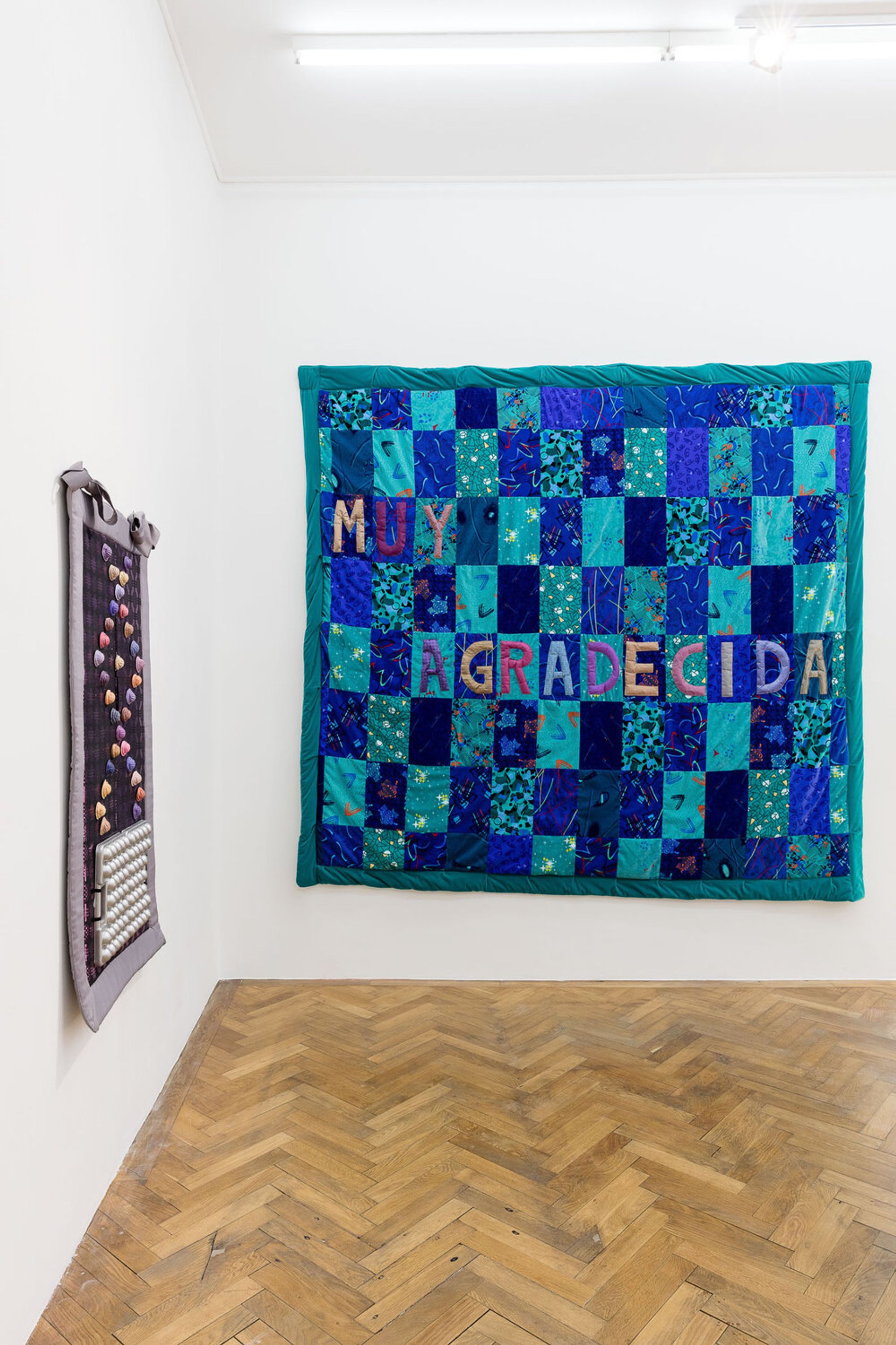 Ana Navas, Muy Agradecida, 2018, fabric used for seats in buses, 272 × 295 cm