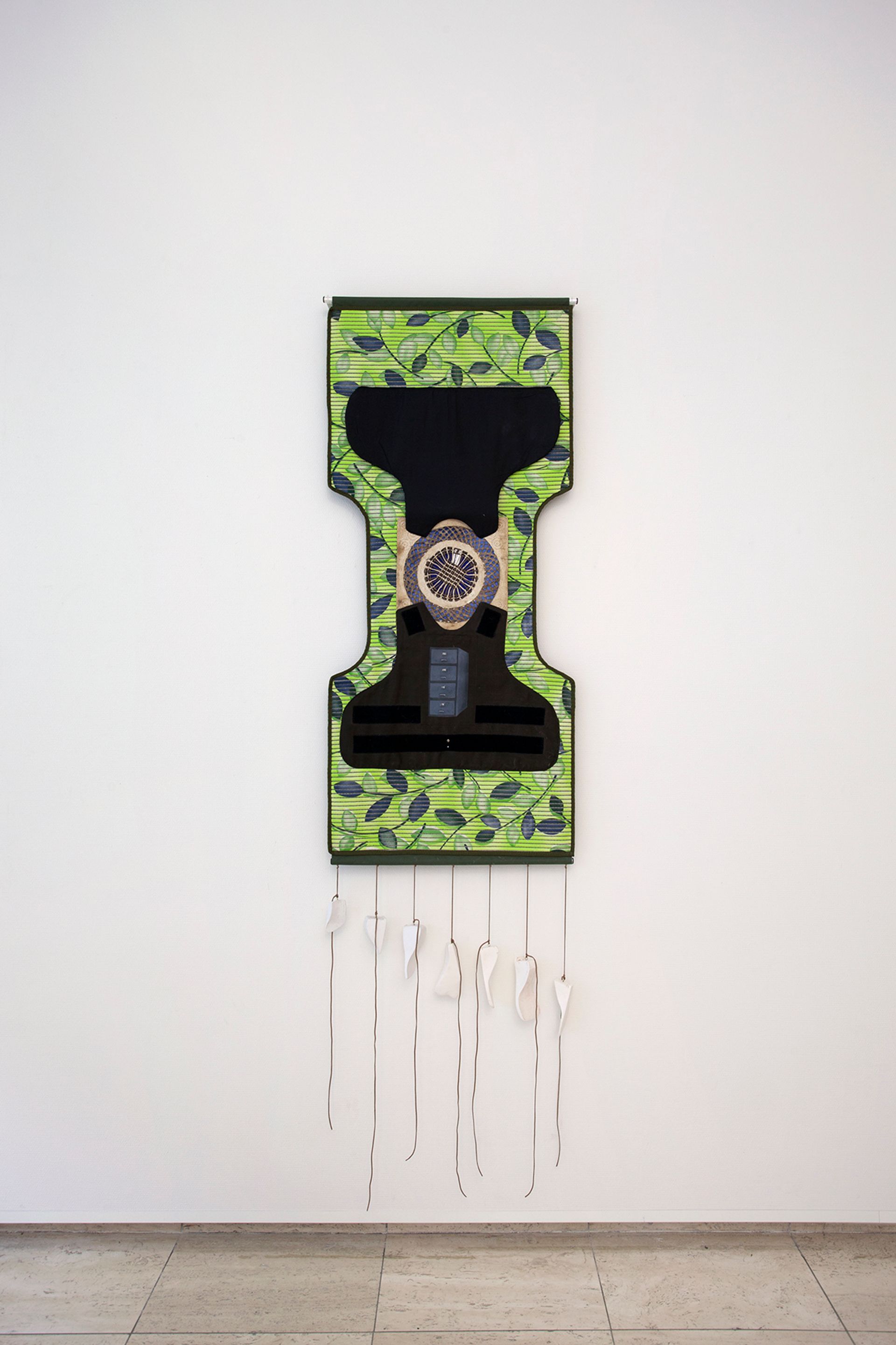 Ana Navas, United, 2018, mat, plaster, fabric, paper, metal, bulletproof vest, piercing, 193 × 65 cm, photo: Otto Polman