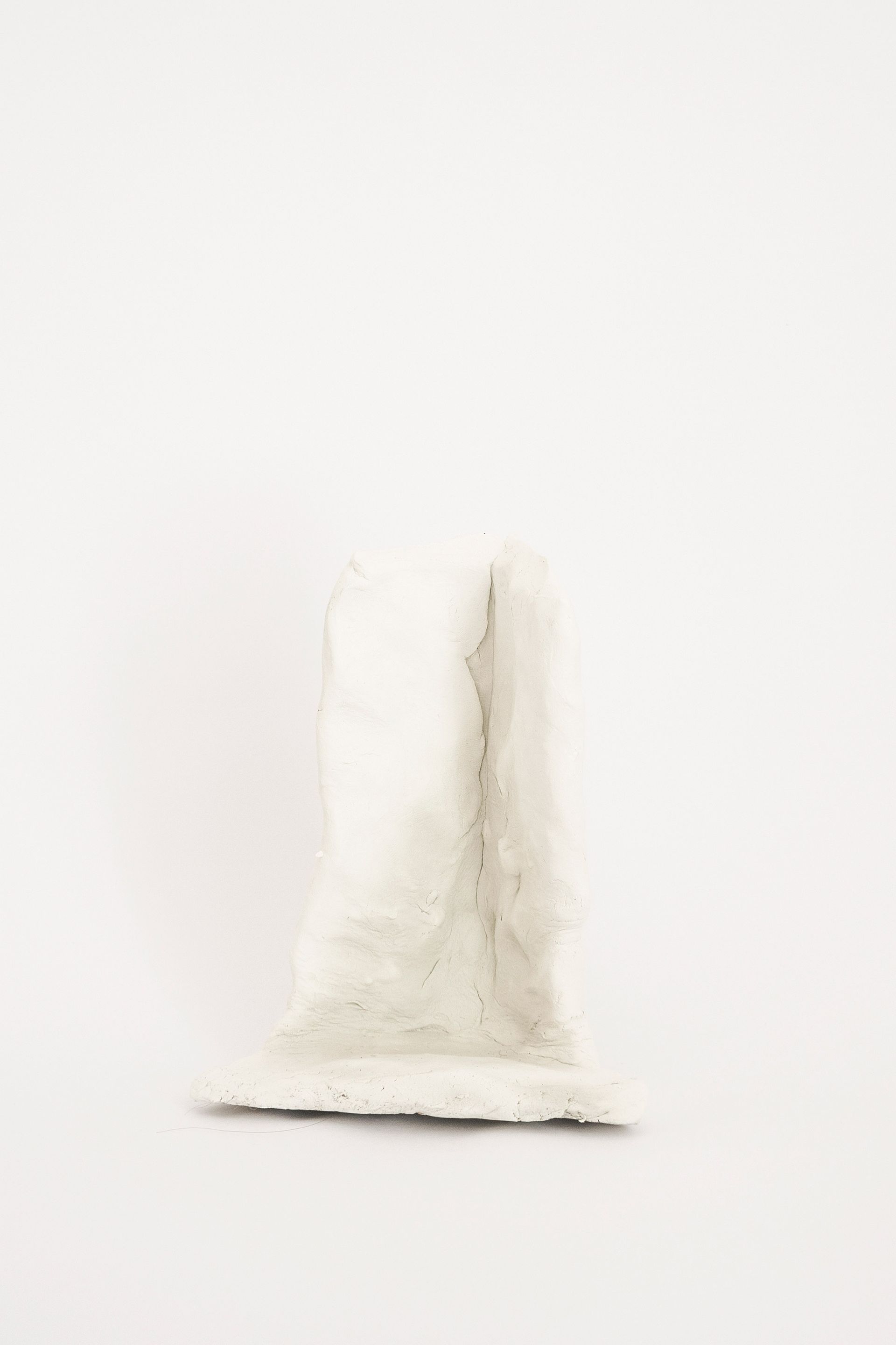 Corners for Relief (No. 5), 2019, Sculpting Clay, Filth, 16 × 12 × 11 cm. These small corner-shaped sculptures are modelled forms of popular peeing corners from public space and can be considered anti-monuments to this topic: Peeing corners may be a result of the lack of public toilets, but they still owe to the fact that ‘men can’ and are a demonstration of male privilege within the public sphere.