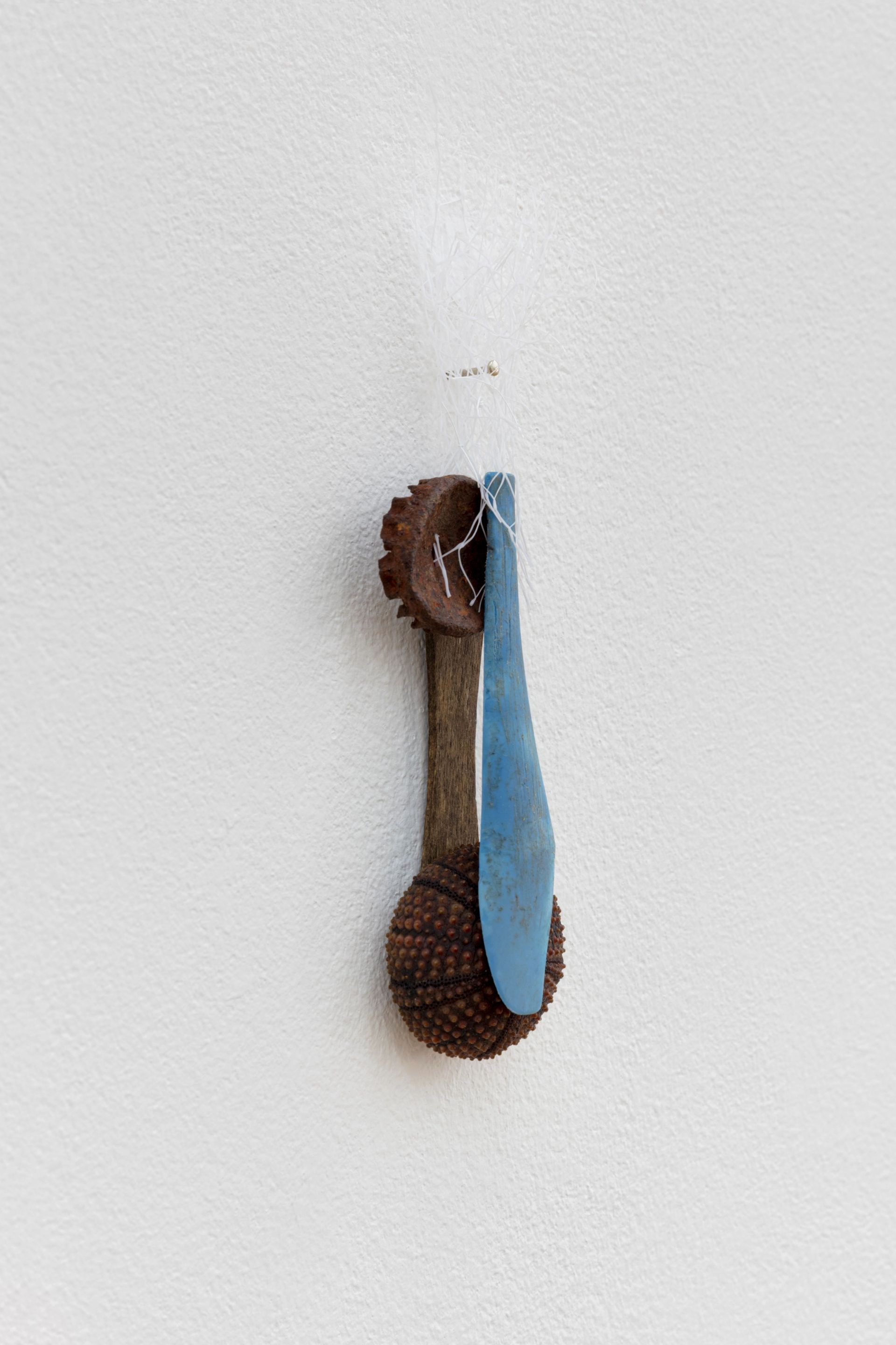David Fesl, Untitled, 2022, soap sleeve, plastic spoon, popsicle stick, bottle cap, gummy seal, sea urchin shell, 15.4 × 4 × 2 cm, photo: Sebastian Kissel