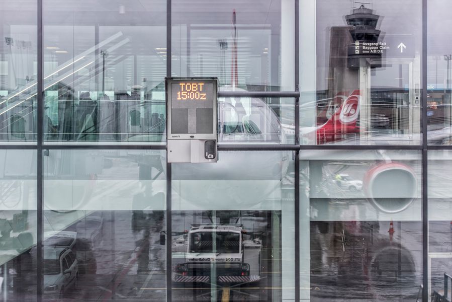 Joe Willems Photography Airport Terminal Window with Large Reflection of an Aircraft