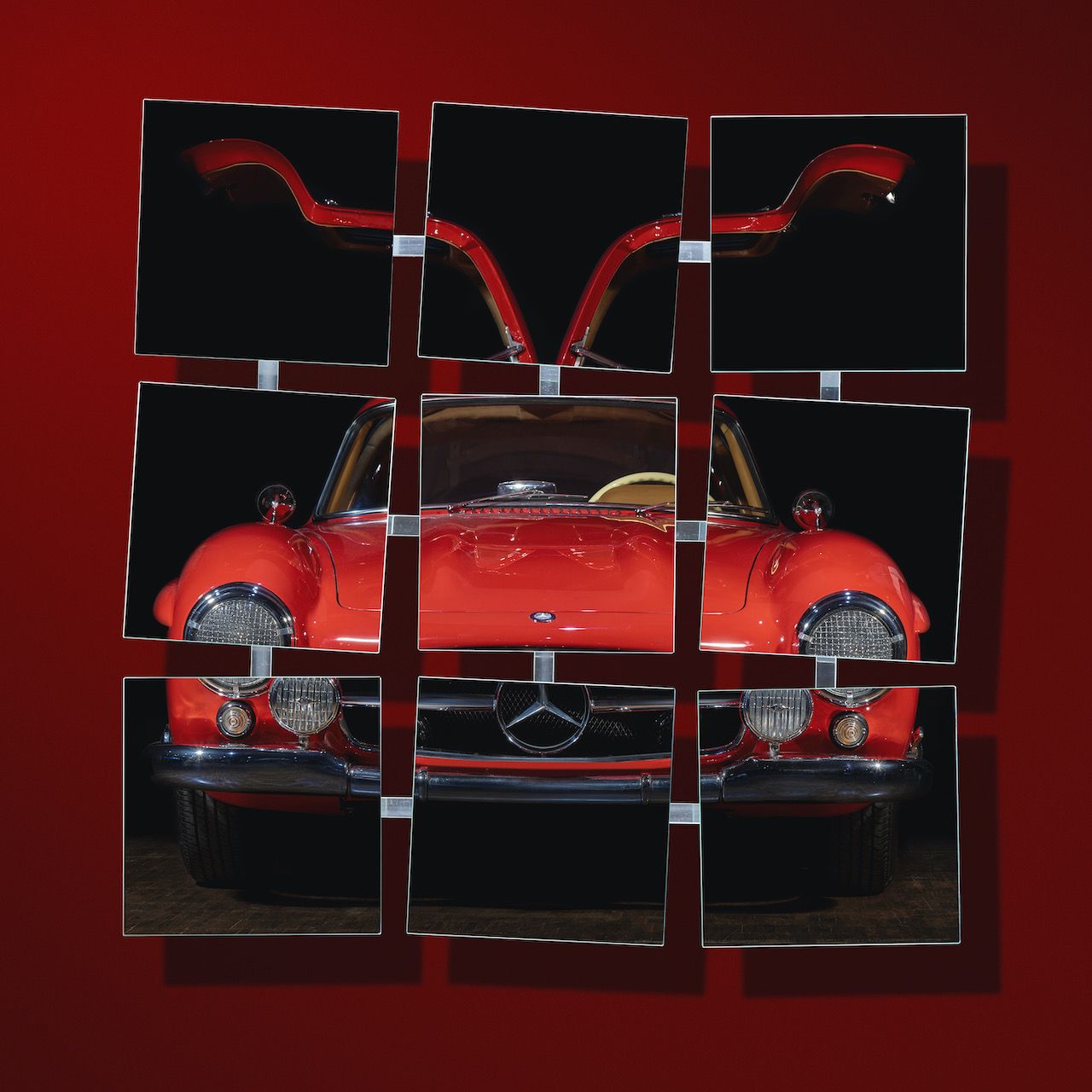 Michael Haegele photography nine square mirrors with red Mercedes sports car on dark red background