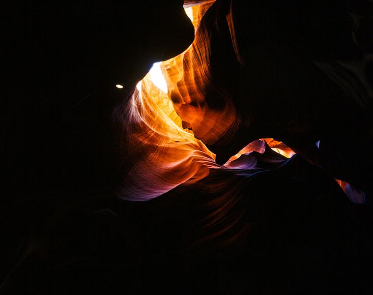 Christian Schuster Photography Stone Gorge Cave in the Dark with Light Beam