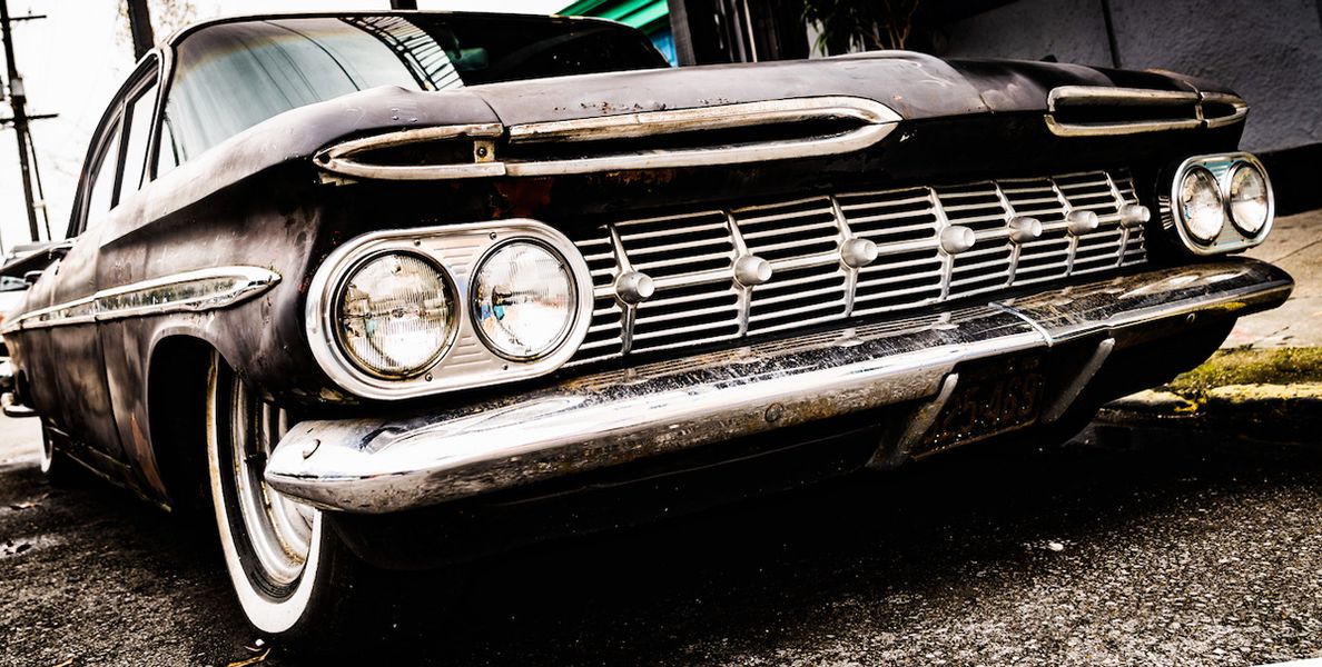 Georgia Ortner Photography dynamic close-up of a black classic car