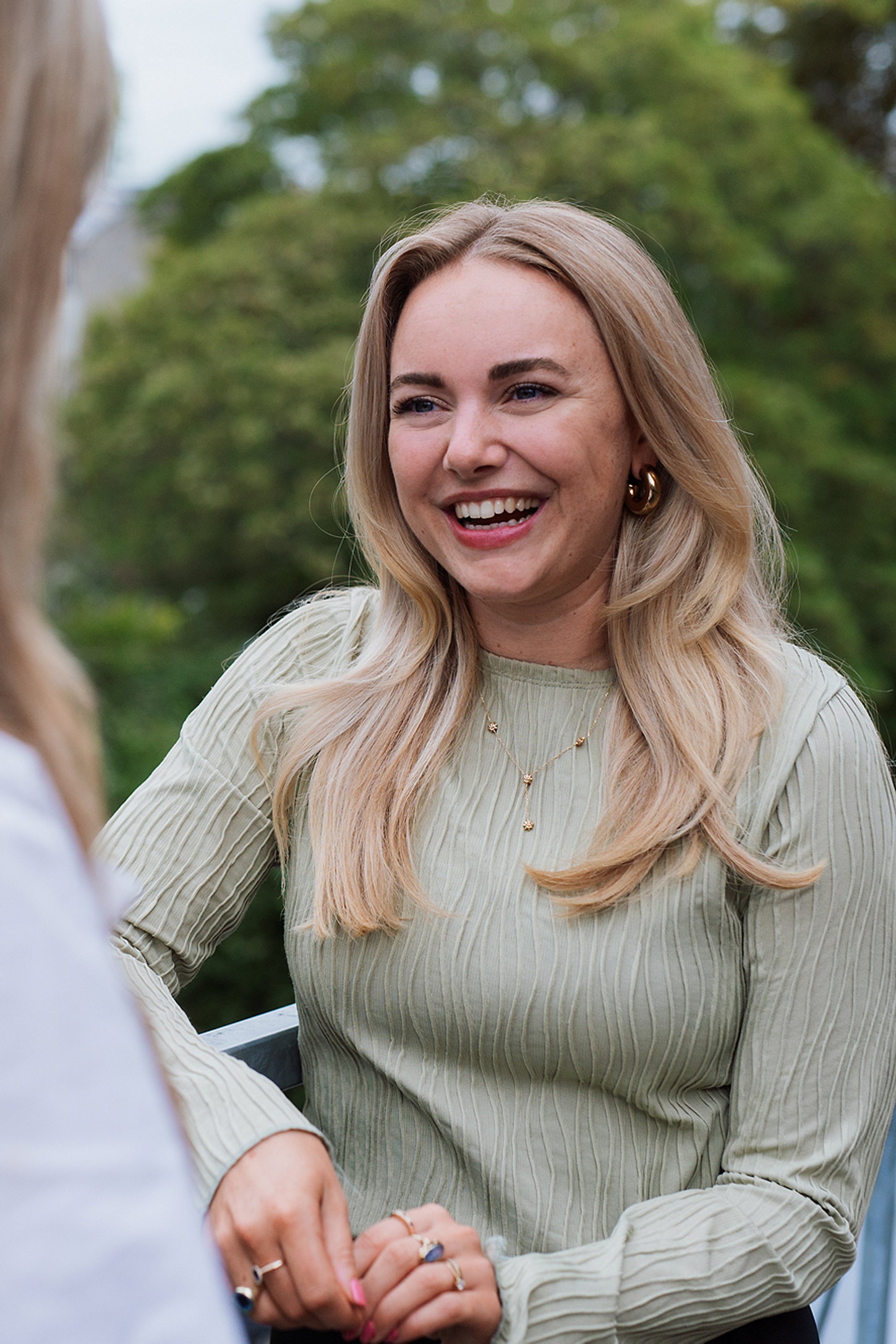 Laughing woman in office