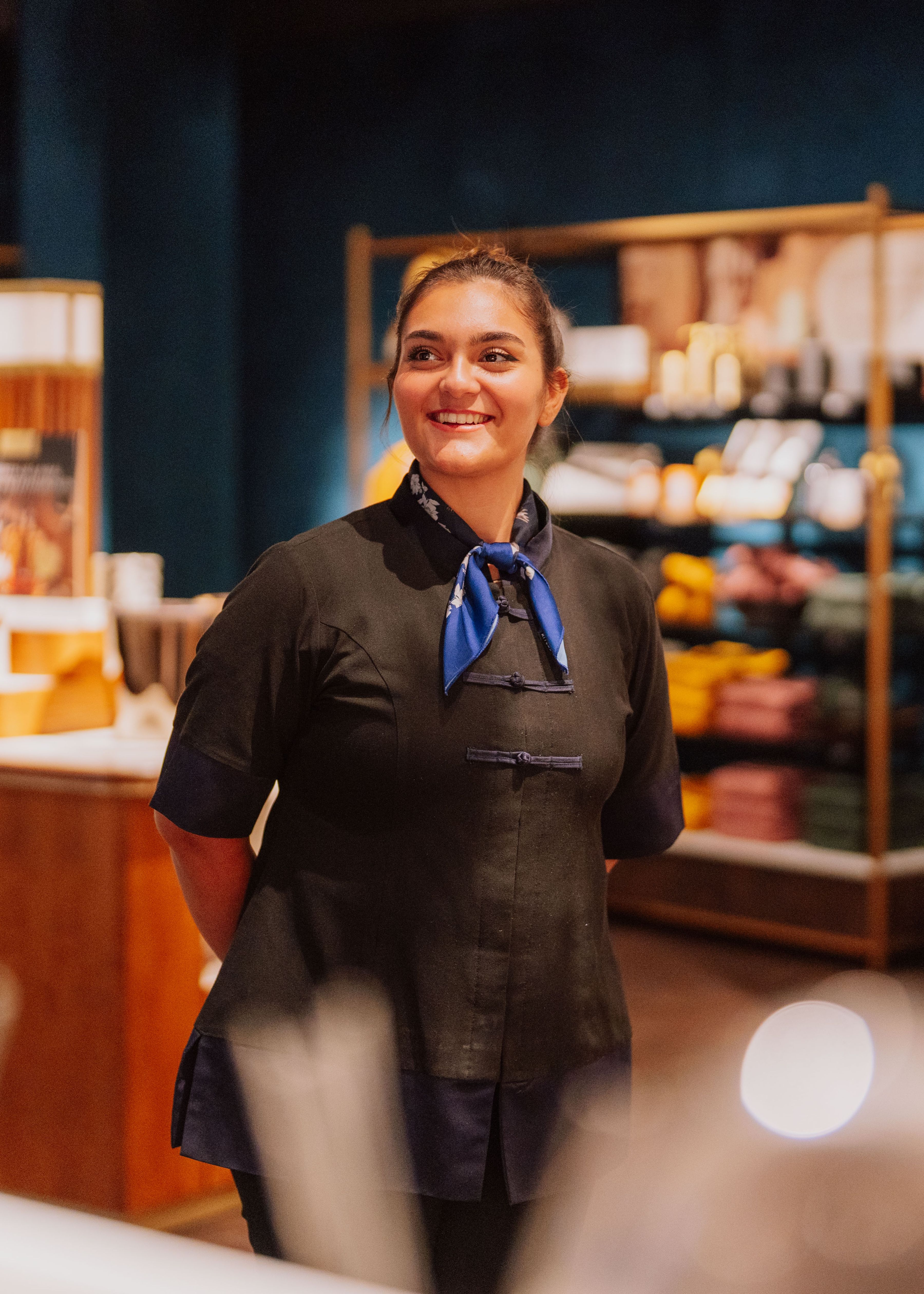 Rituals butikkansatt smiler