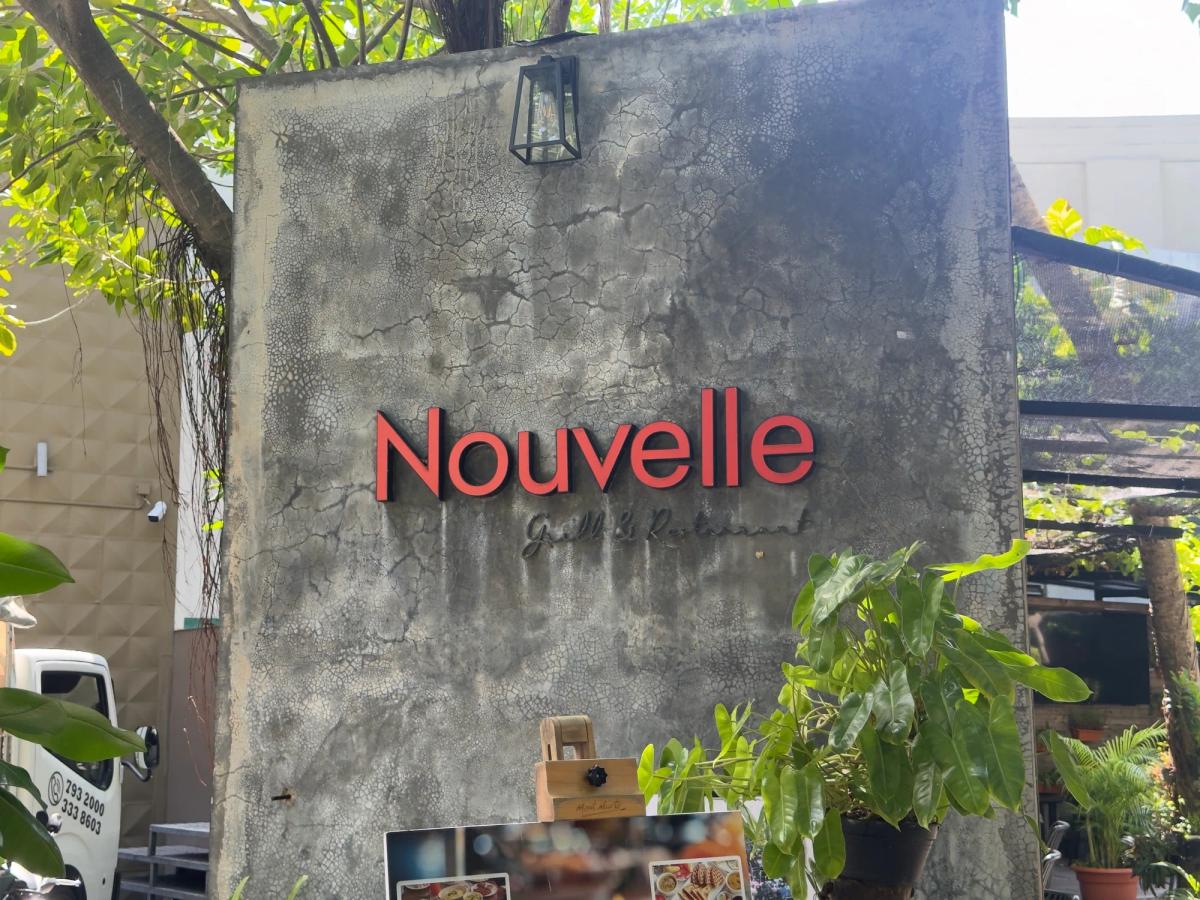 Entrance sign of Nouvelle Grill & Restaurant in Malé