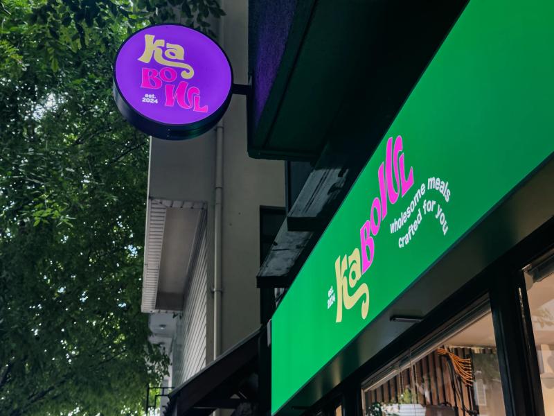 KaBowl storefront in Malé with a round purple hanging sign and a green fascia with pink and yellow lettering