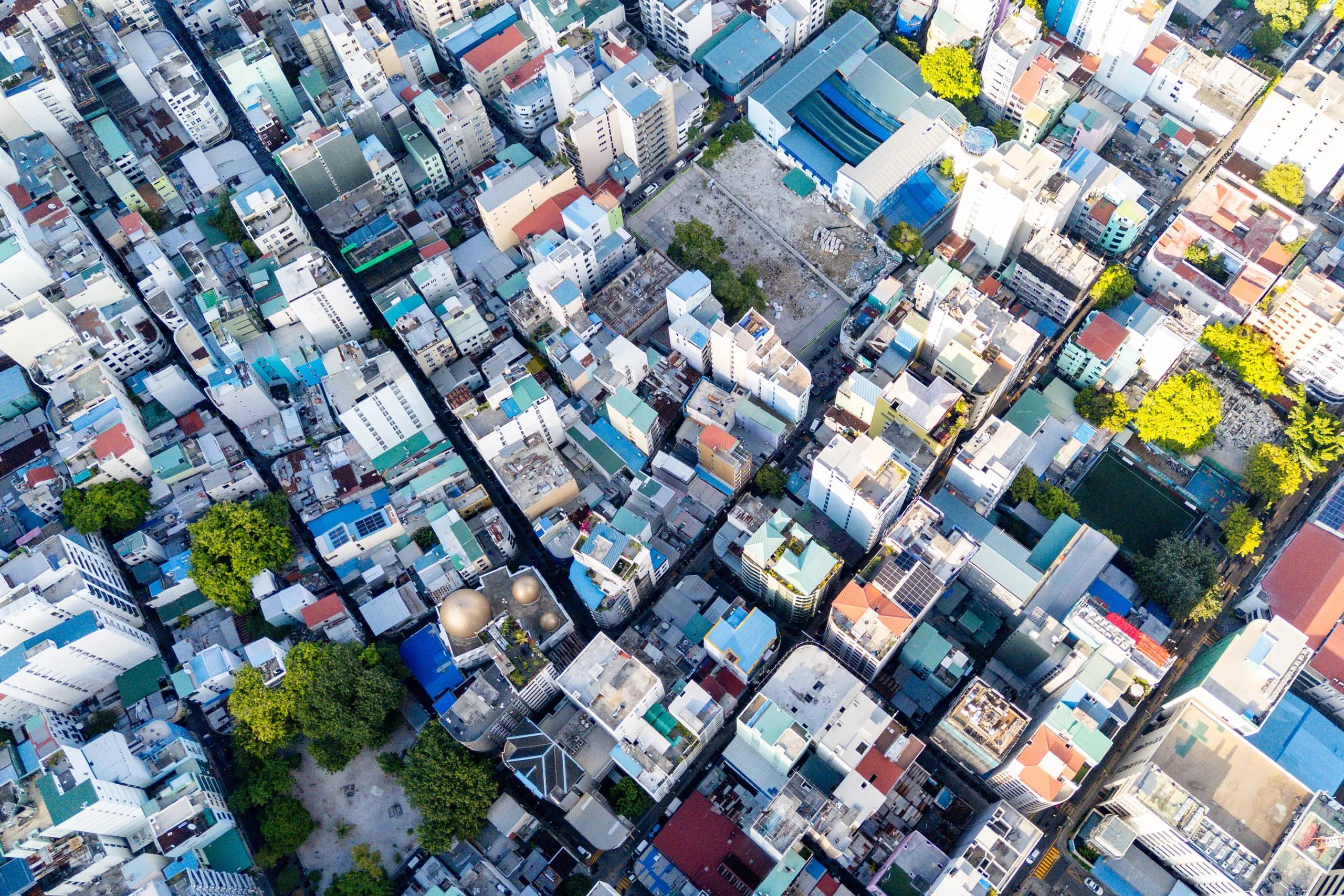 Diagonal top-down drone view of Malé's street grid