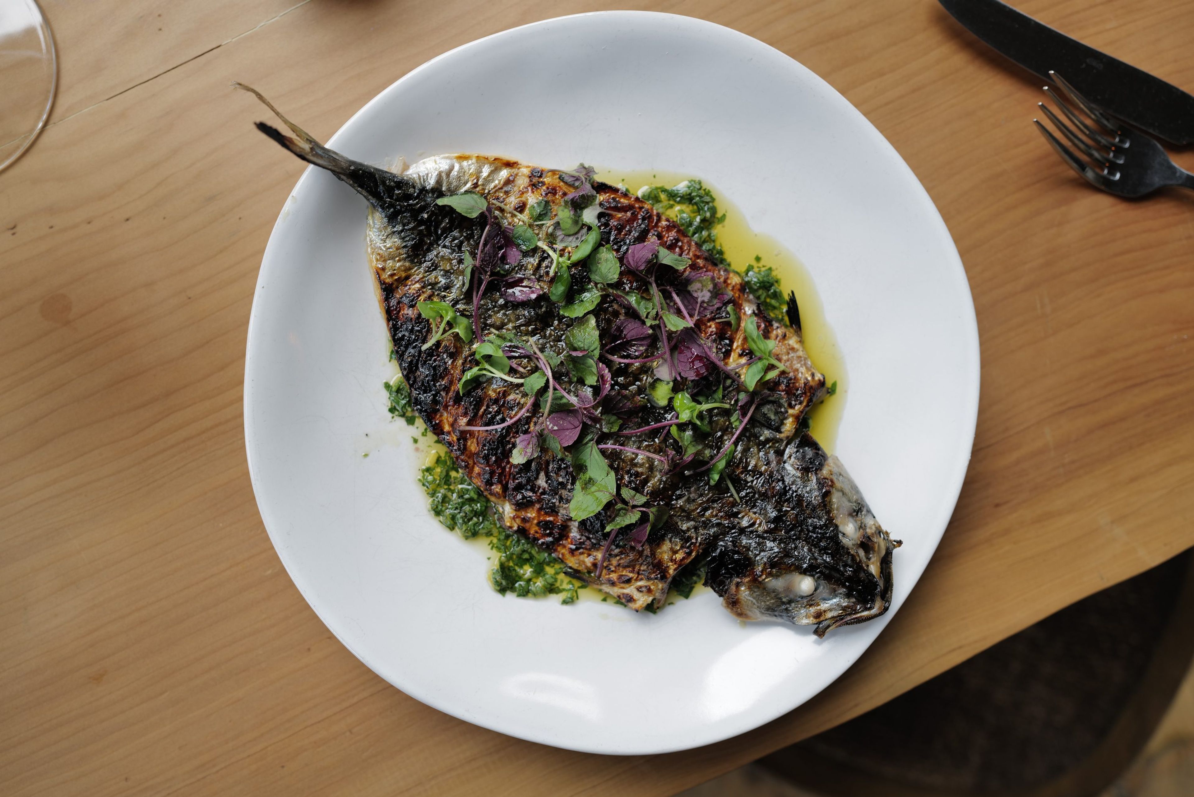 Whole grilled mackerel with gremolata and herbs