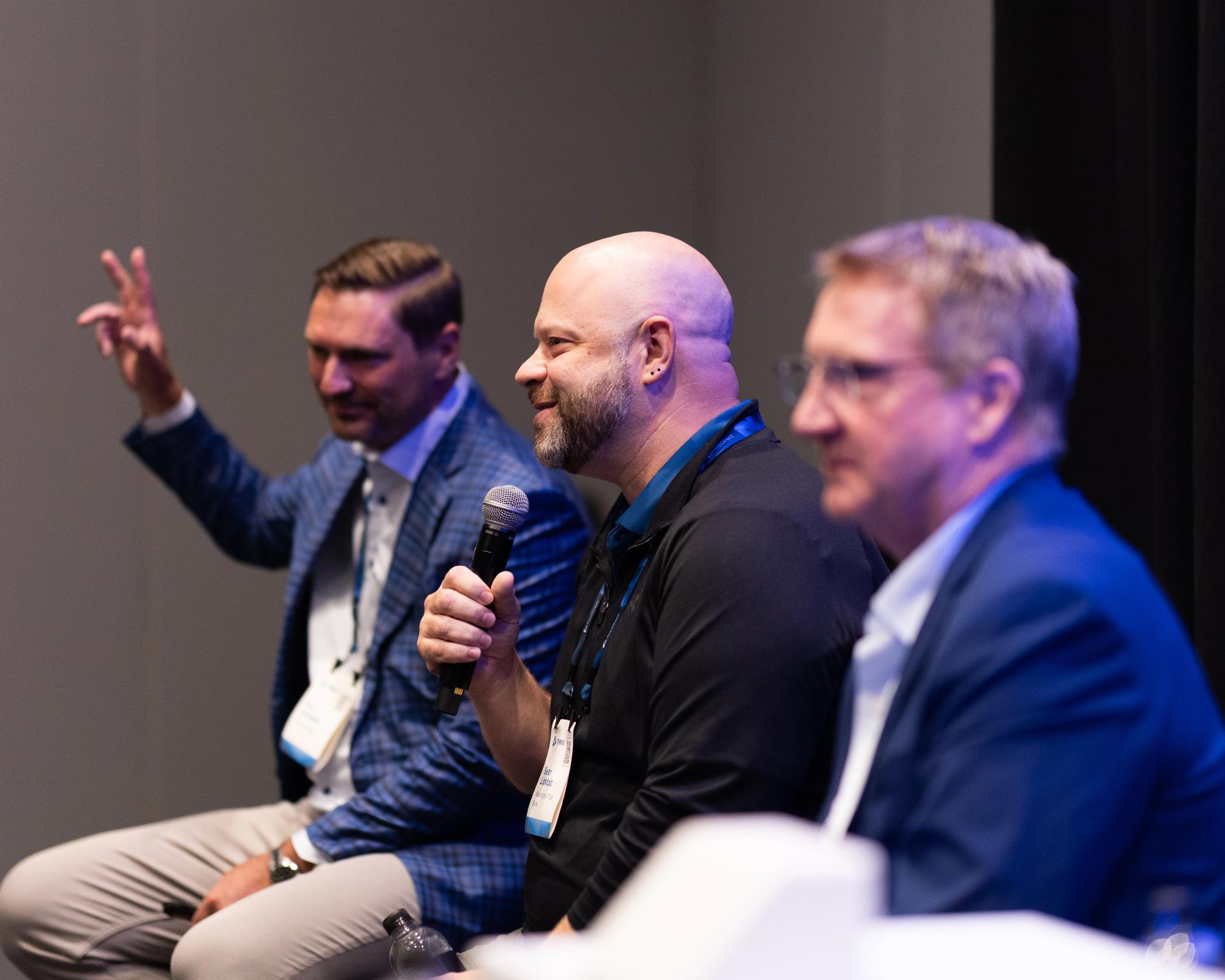 Executive panel programming — narrative formats designed for candid, on-stage dialogue.