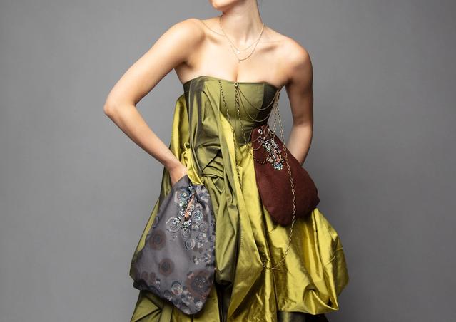 Goosebumps | Eleanor O’Hare | Draped raw silk corset chain dress, with hand embellished pocket bags using glass beads.
