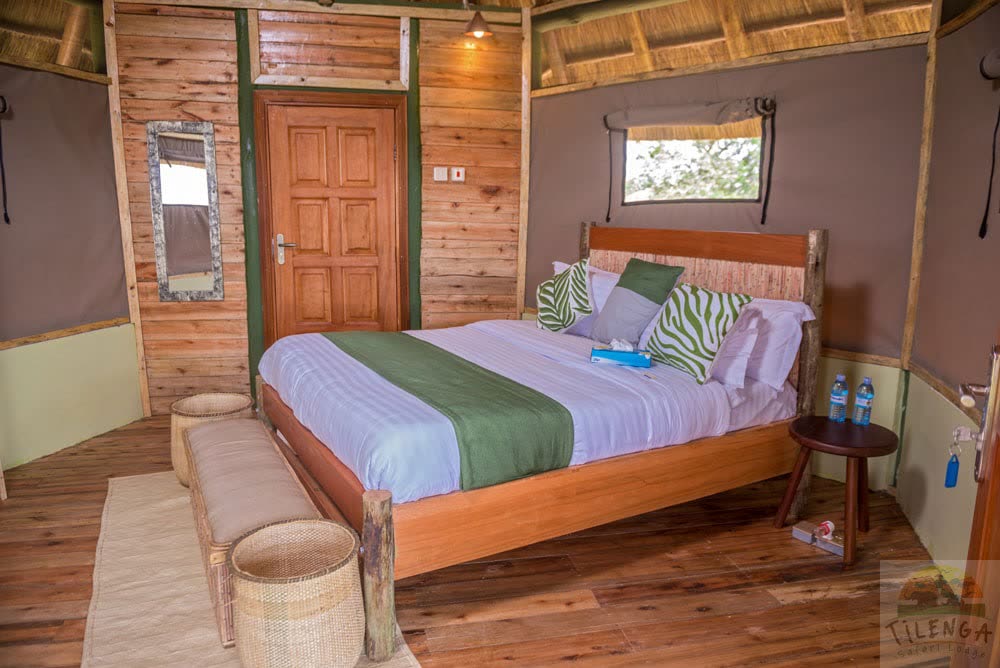 Timber-walled tent bedroom