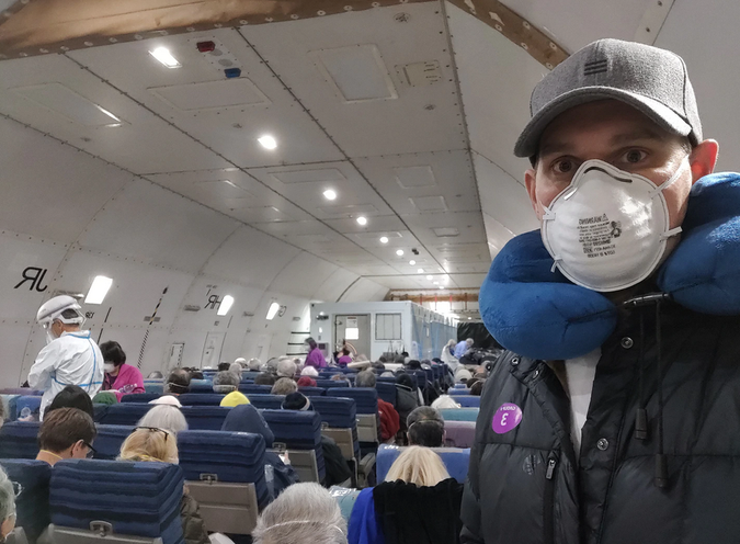 Selfie from inside a plane transporting COVID patients