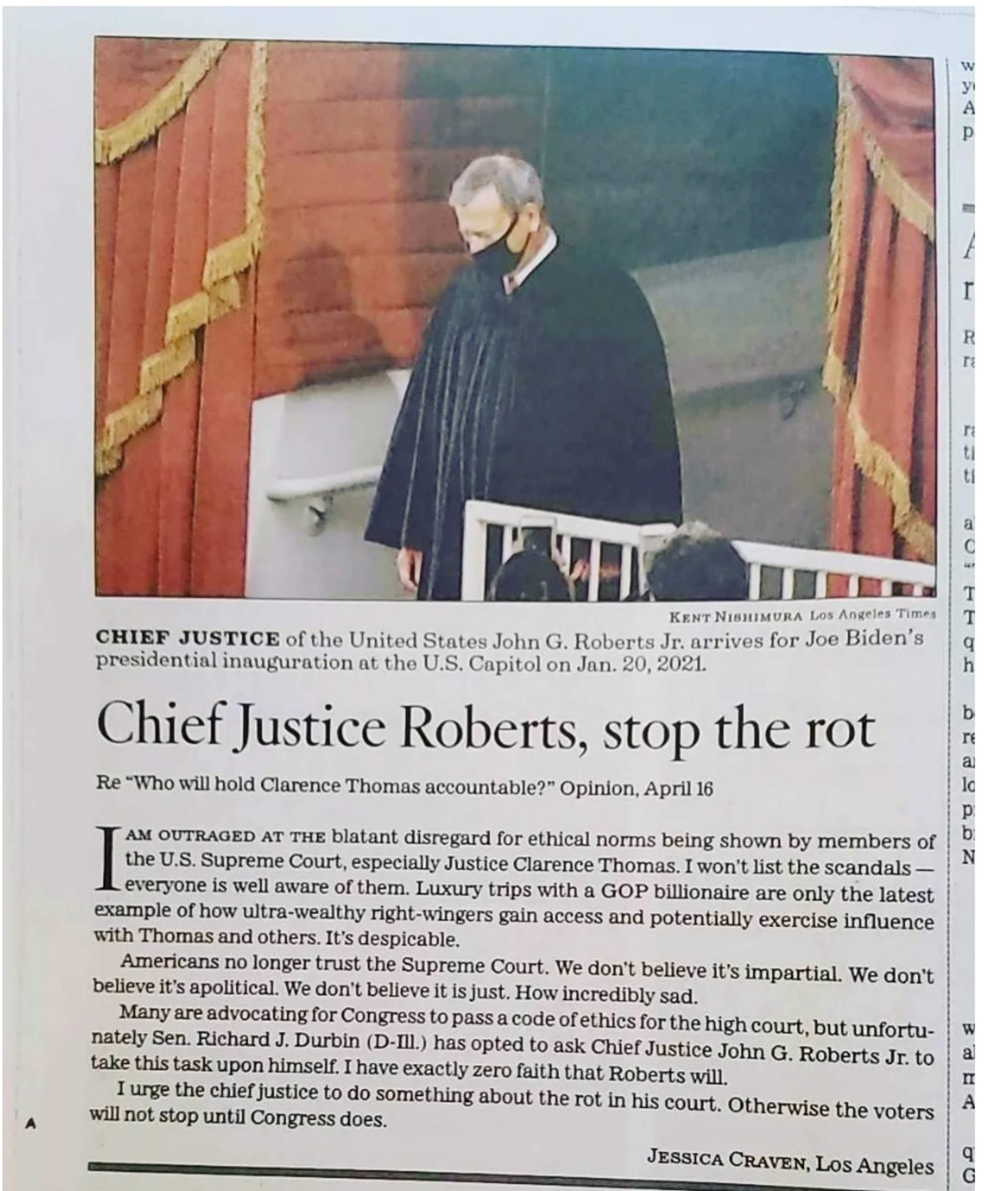 Newspaper headline with photo of Chief Justice Roberts 