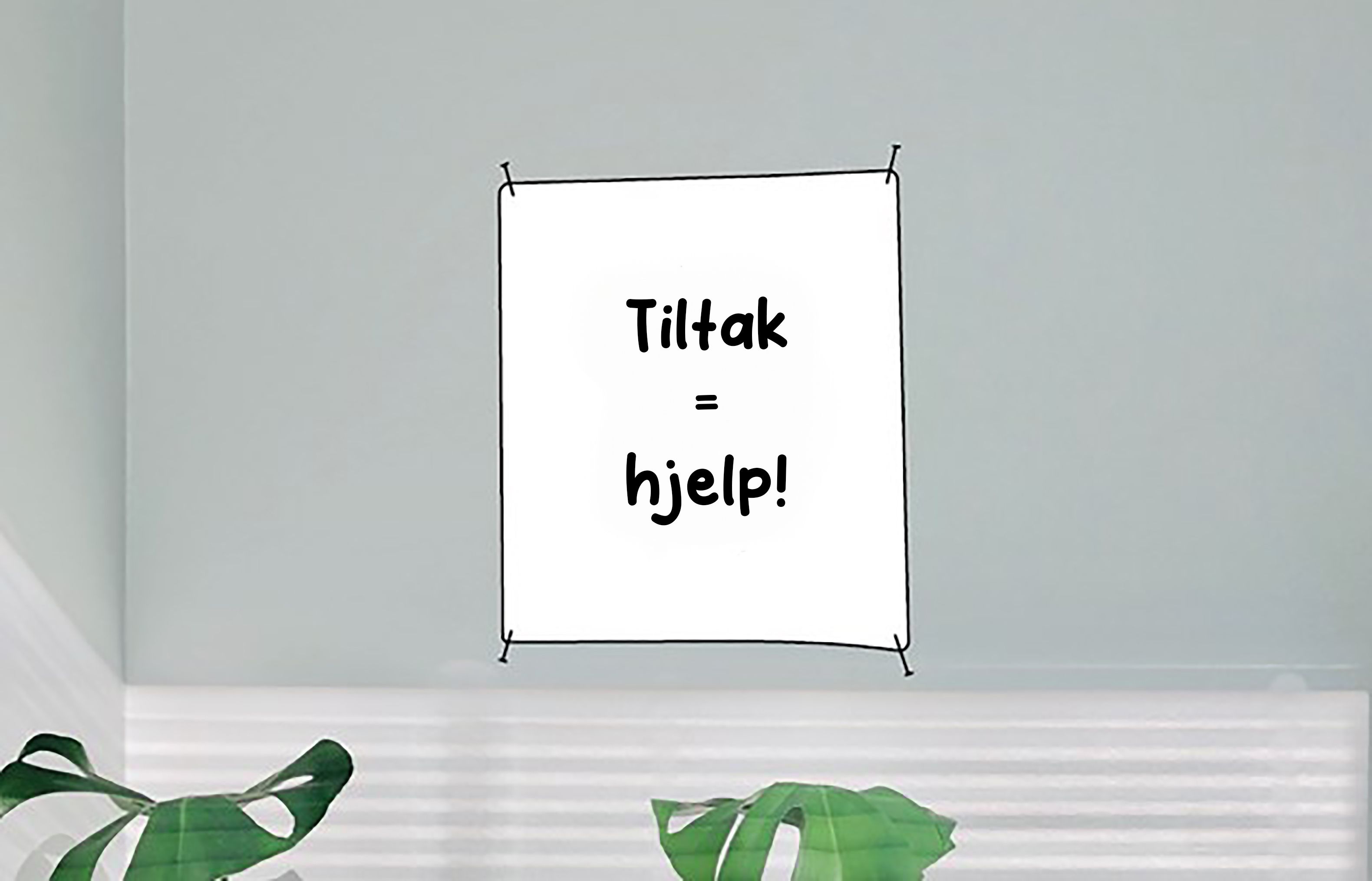 Det henger en plakat på en vegg. Det står: "Tiltak er lik hjelp!"