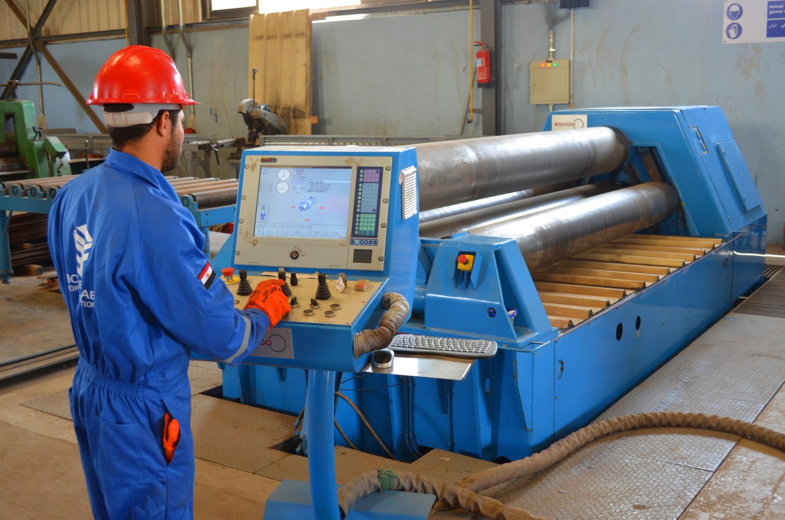 BSF operator at the Roundo hydraulic plate bending roll in Alexandria, Egypt